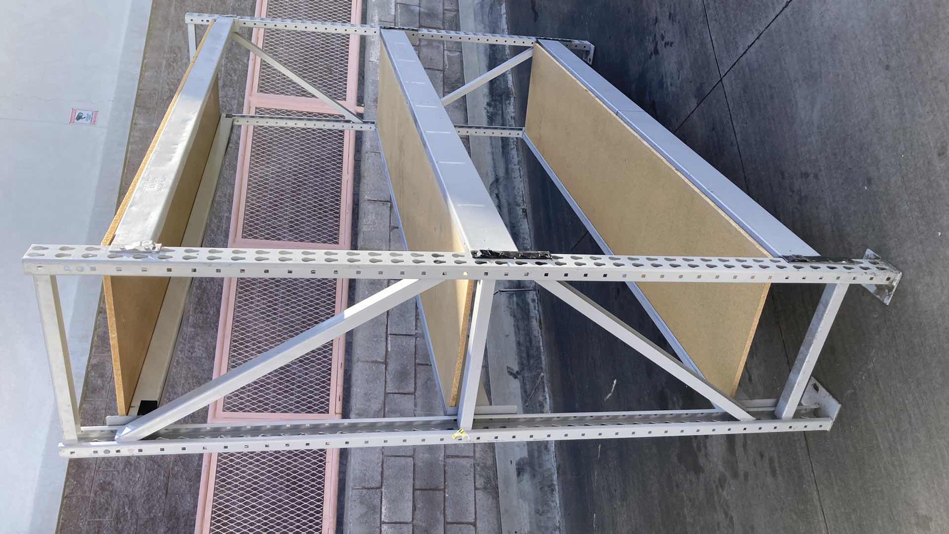 Photo 1 of MADIX HEAVY DUTY STEEL RACK W PARTICLE BOARD SHELVES 102” X 23” H 85”