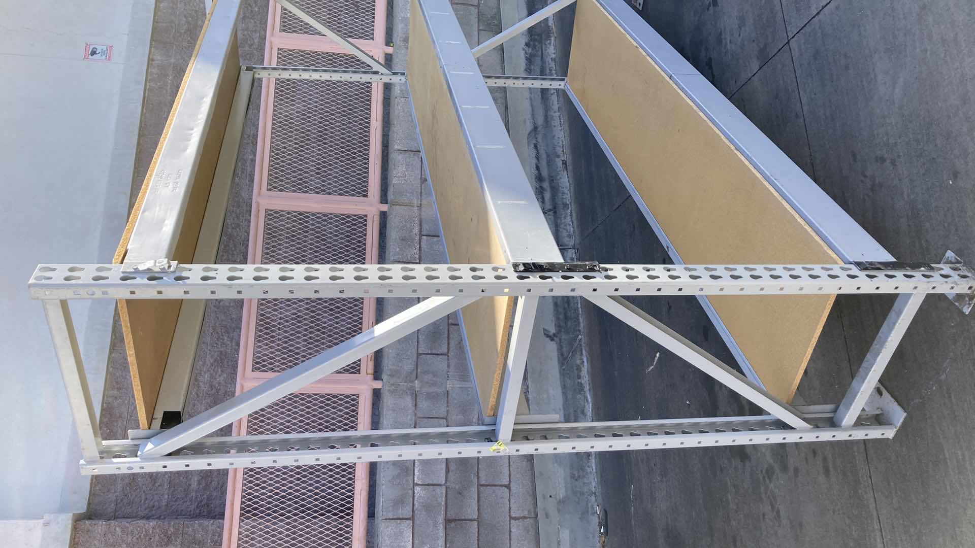 Photo 1 of MADIX HEAVY DUTY STEEL RACK W PARTICLE BOARD SHELVES 102” X 23” H 85”