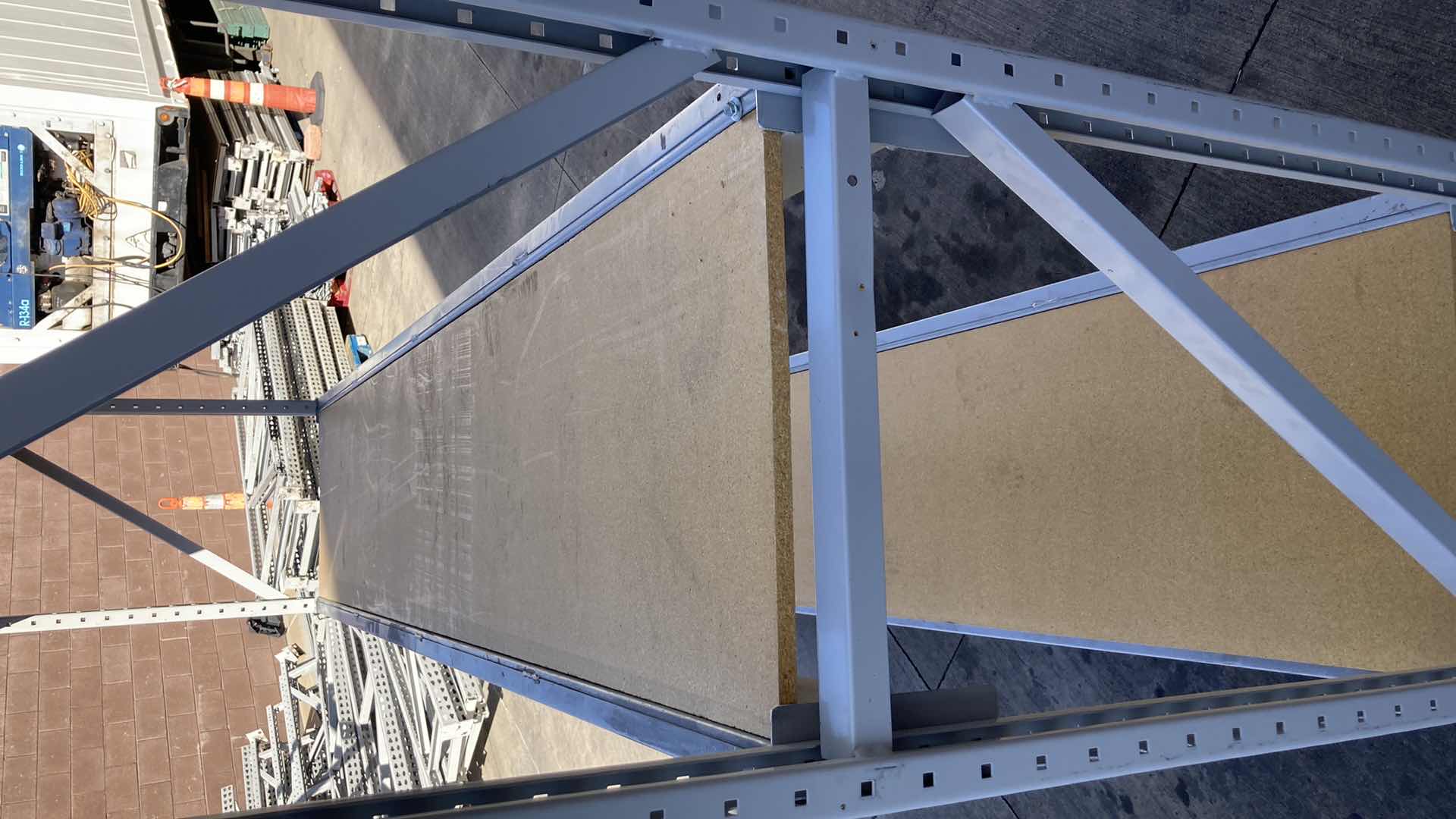 Photo 1 of MADIX HEAVY DUTY STEEL RACK W PARTICLE BOARD SHELVES 102” X 23” H 85”