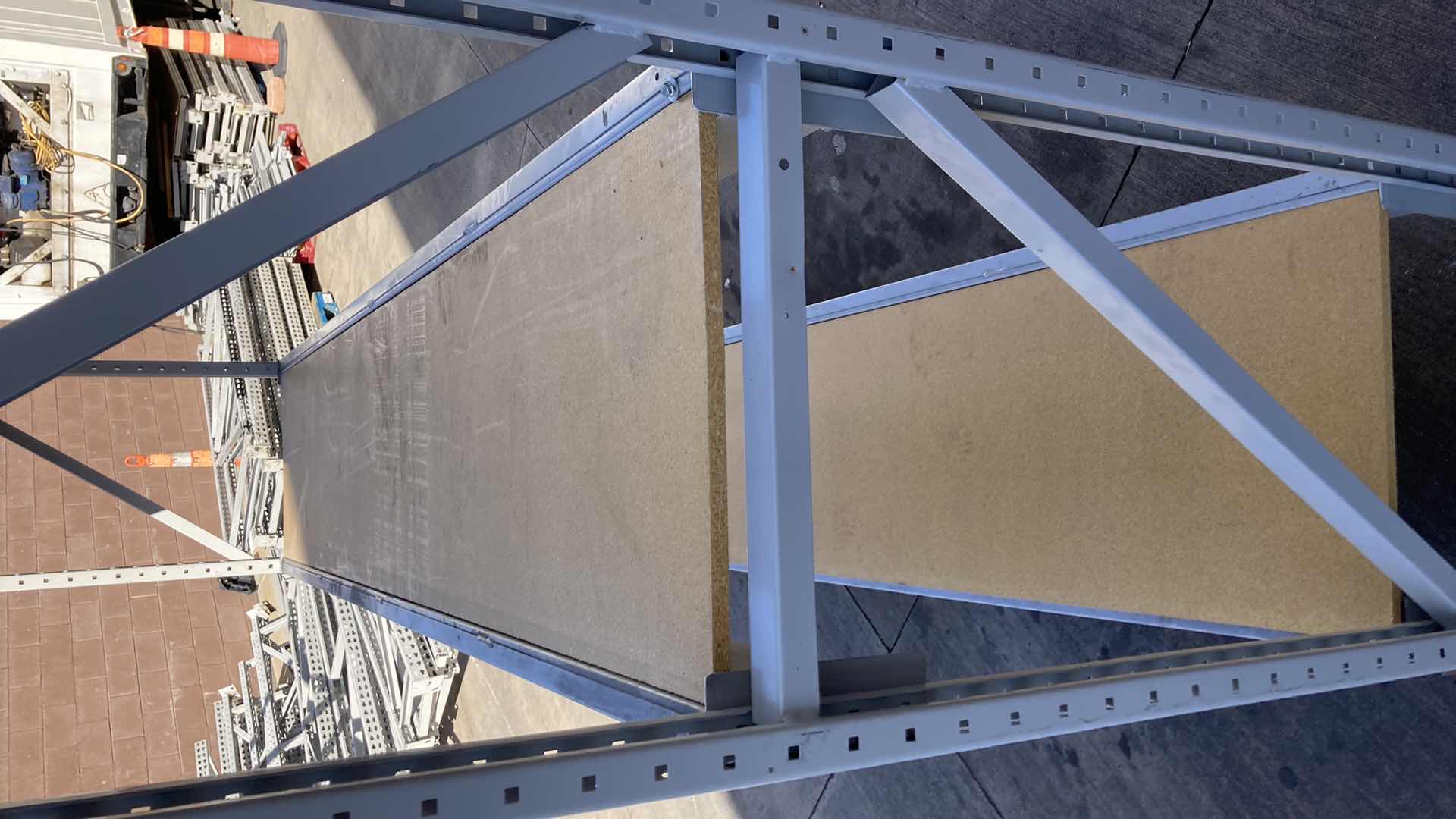 Photo 1 of MADIX HEAVY DUTY STEEL RACK W PARTICLE BOARD SHELVES 102” X 23” H 85”