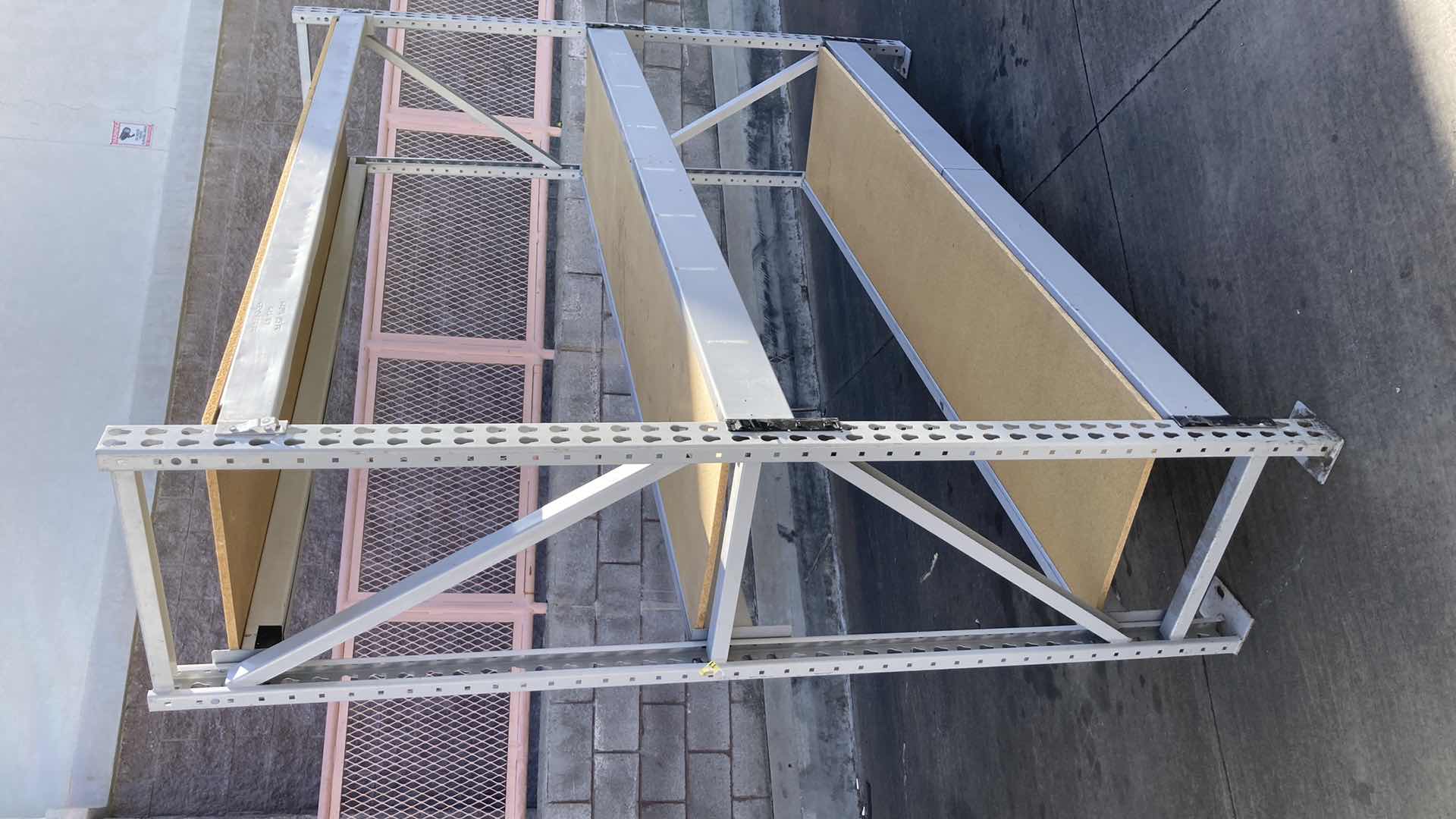 Photo 1 of MADIX HEAVY DUTY STEEL RACK W PARTICLE BOARD SHELVES 102” X 23” H 85”