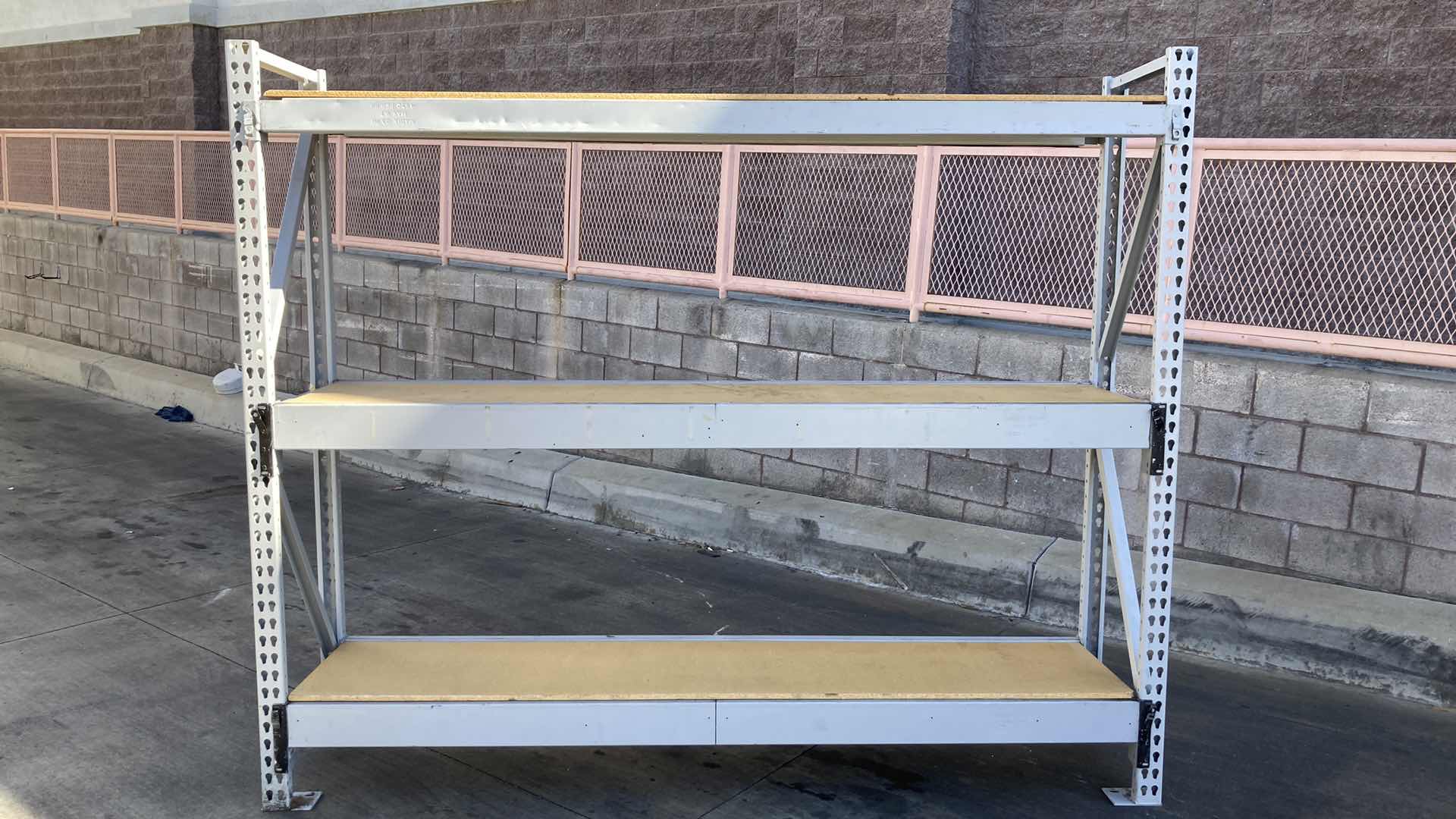 Photo 1 of MADIX HEAVY DUTY STEEL RACK W PARTICLE BOARD SHELVES 102” X 23” H 85”