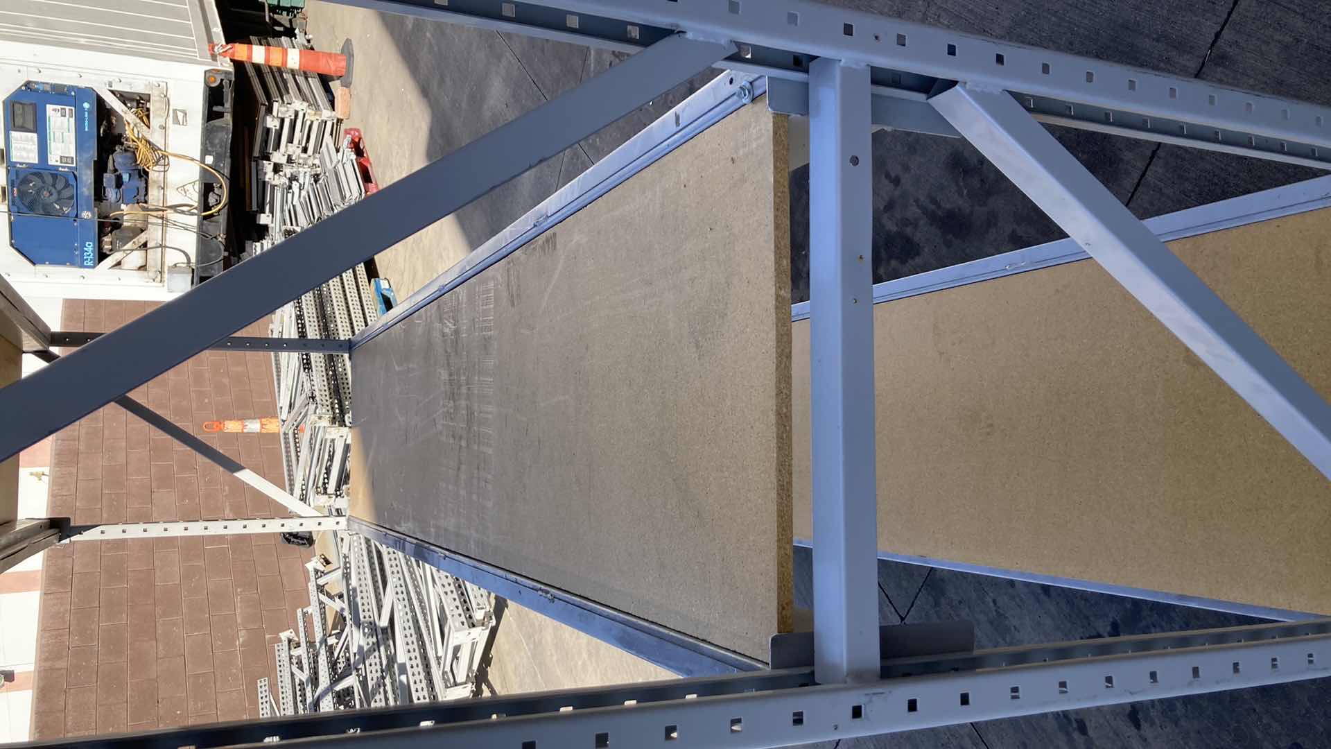 Photo 1 of MADIX HEAVY DUTY STEEL RACK W PARTICLE BOARD SHELVES 102” X 23” H 85”