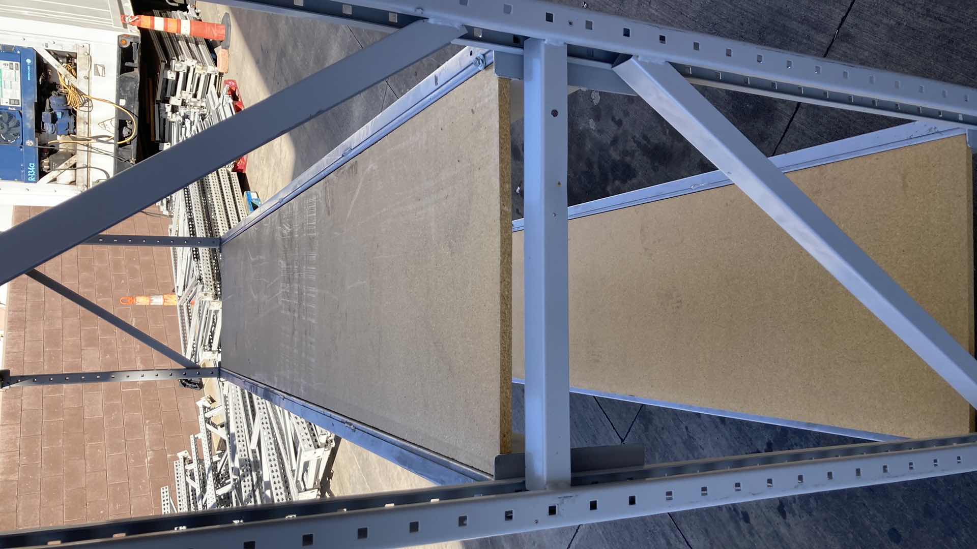 Photo 1 of MADIX HEAVY DUTY STEEL RACK W PARTICLE BOARD SHELVES 102” X 23” H 85”