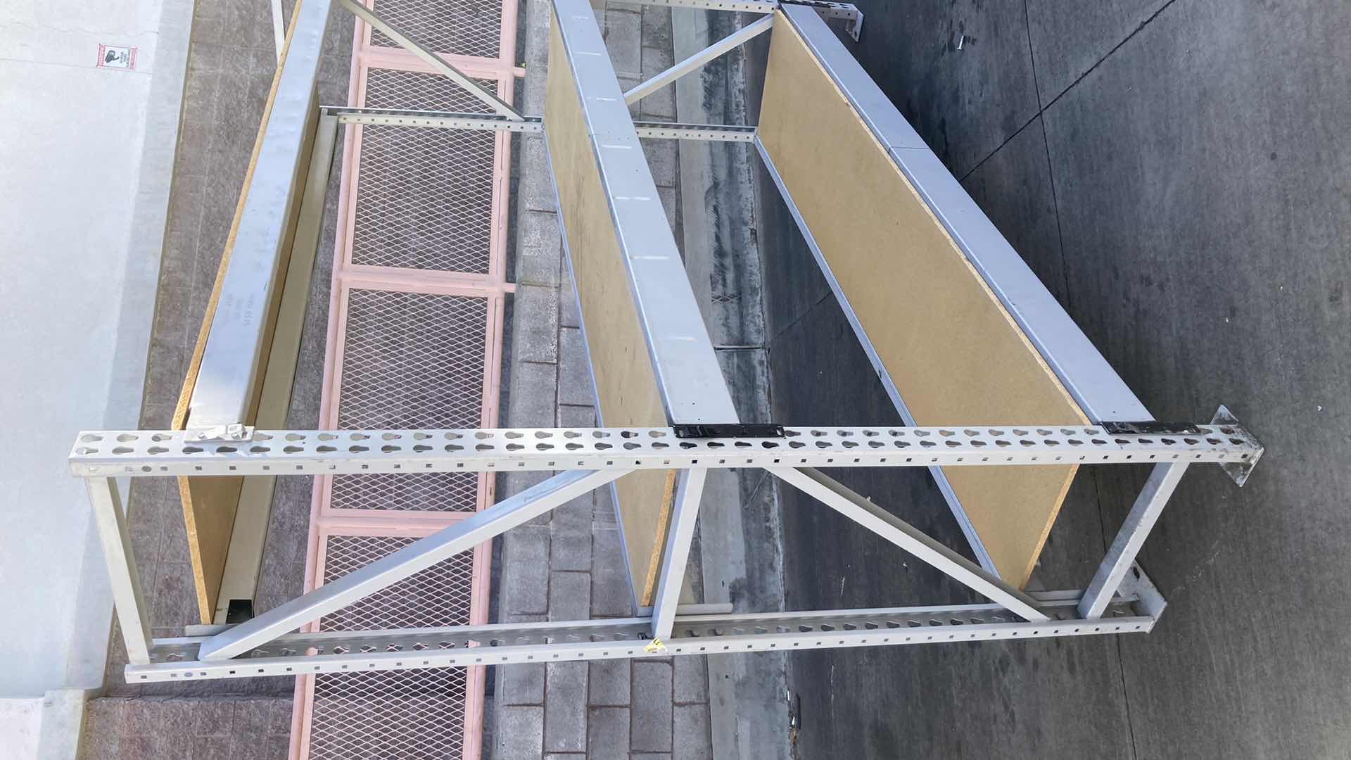 Photo 1 of MADIX HEAVY DUTY STEEL RACK W PARTICLE BOARD SHELVES 102” X 23” H 85”