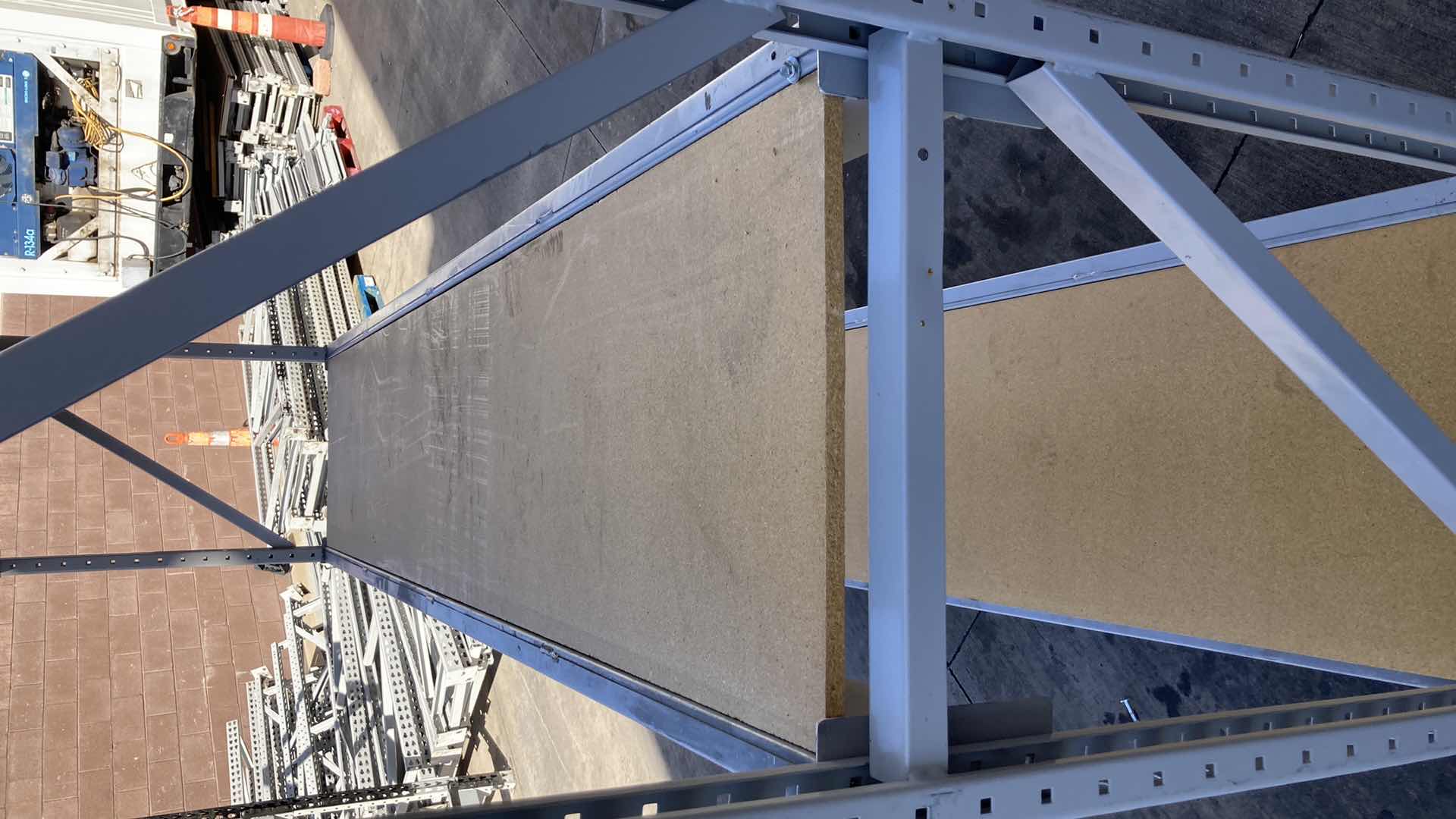 Photo 1 of MADIX HEAVY DUTY STEEL RACK W PARTICLE BOARD SHELVES 102” X 23” H 85”