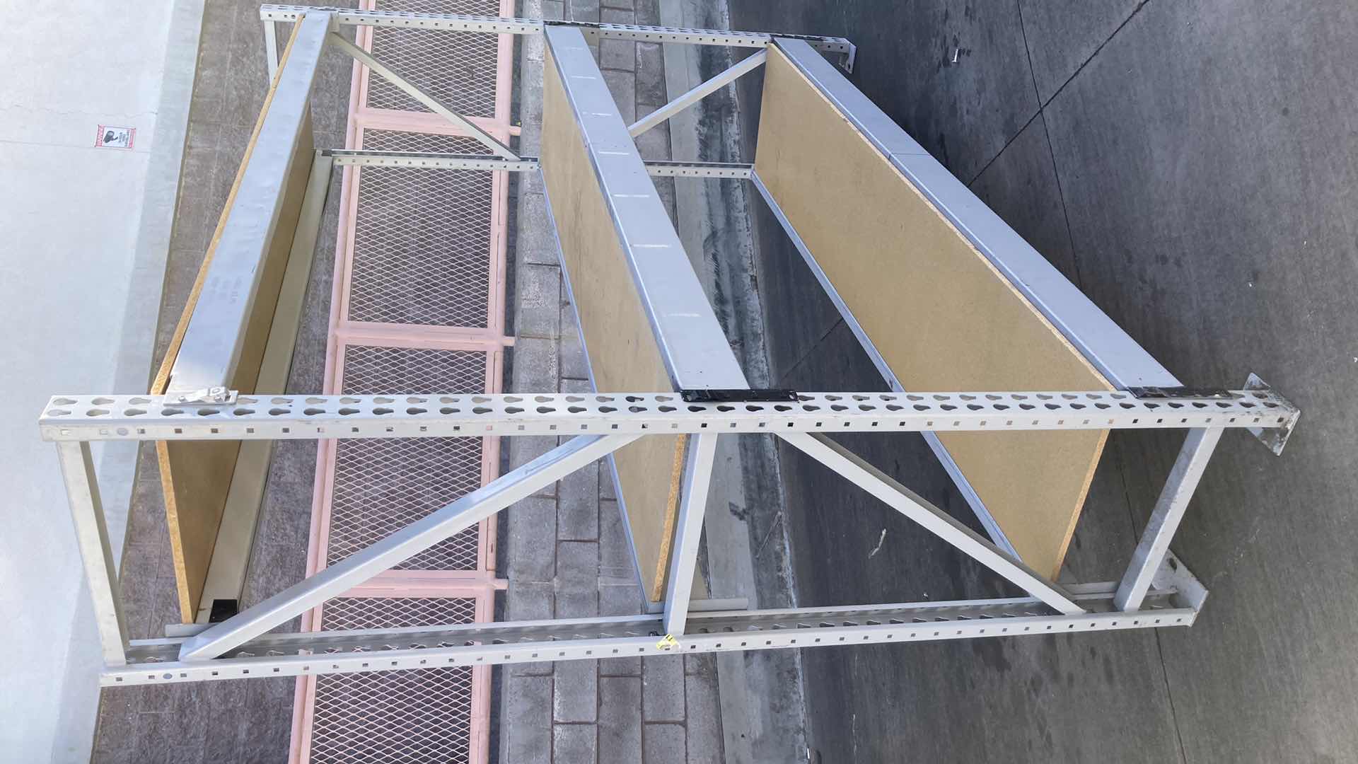 Photo 1 of MADIX HEAVY DUTY STEEL RACK W PARTICLE BOARD SHELVES 102” X 23” H 85”