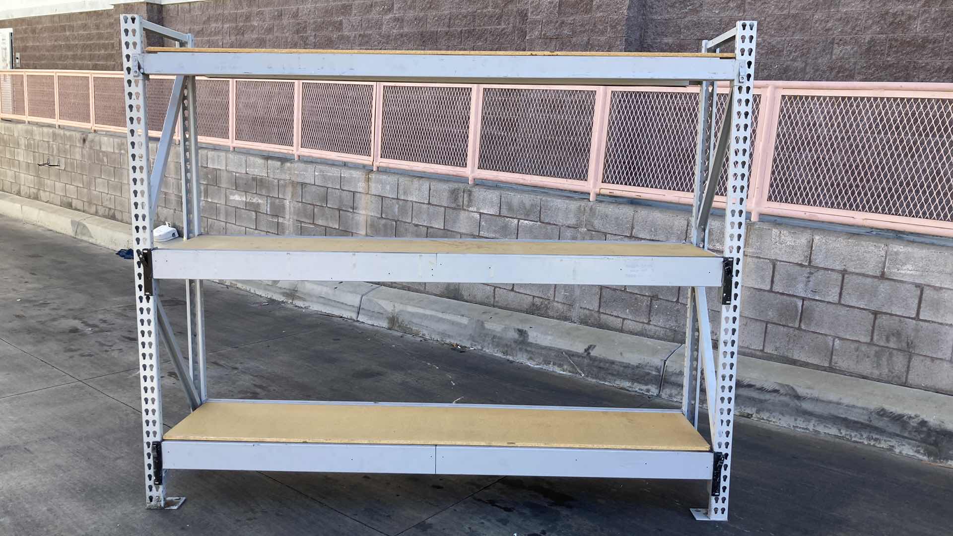 Photo 1 of MADIX HEAVY DUTY STEEL RACK W PARTICLE BOARD SHELVES 102” X 23” H 85”