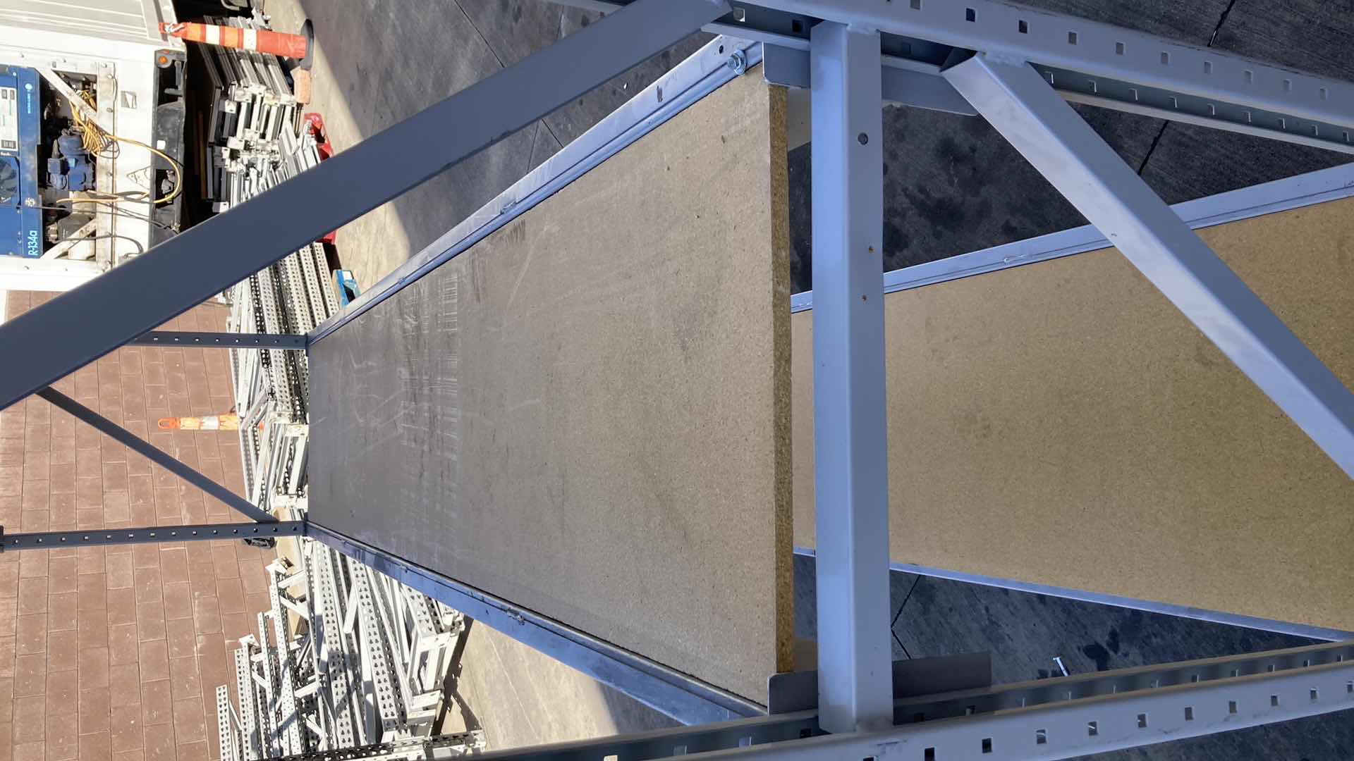 Photo 1 of MADIX HEAVY DUTY STEEL RACK W PARTICLE BOARD SHELVES 102” X 23” H 85”