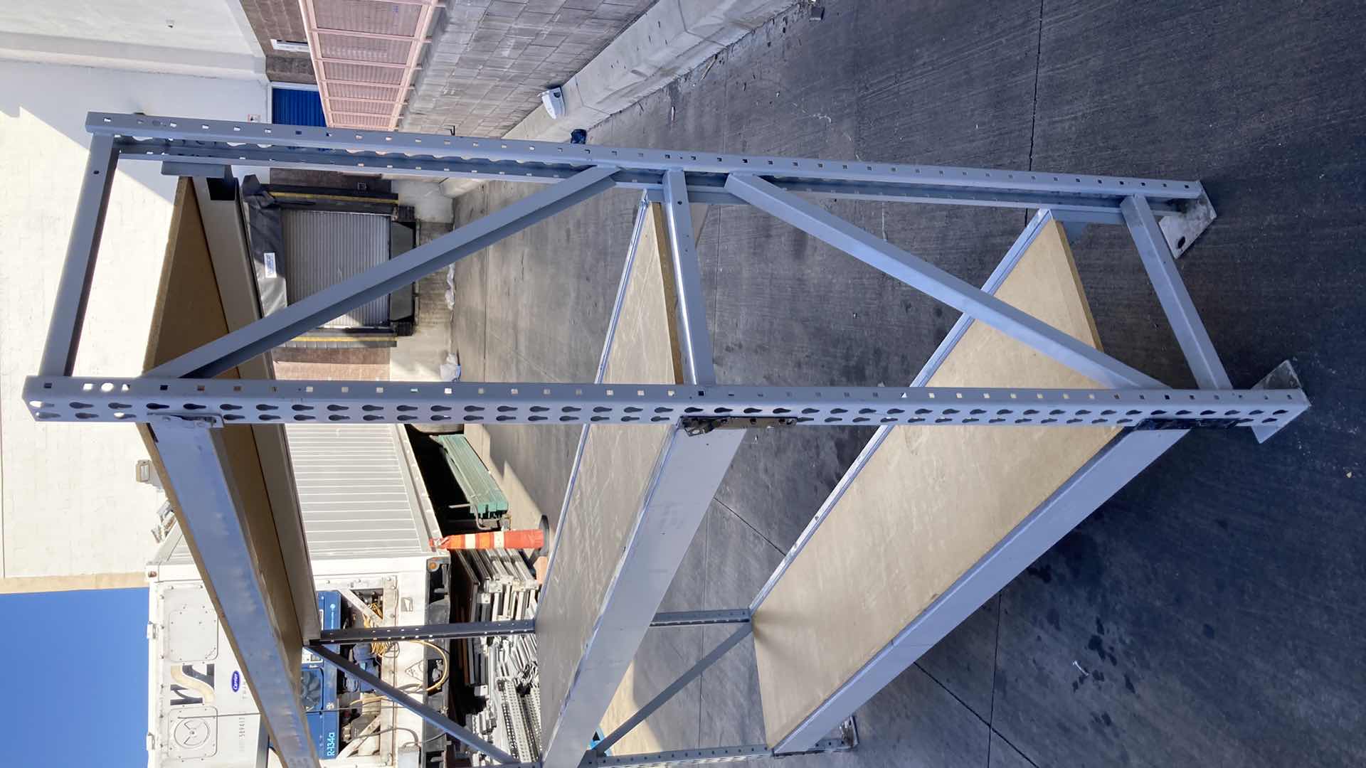 Photo 3 of MADIX HEAVY DUTY STEEL RACK W PARTICLE BOARD SHELVES 102” X 23” H 85”