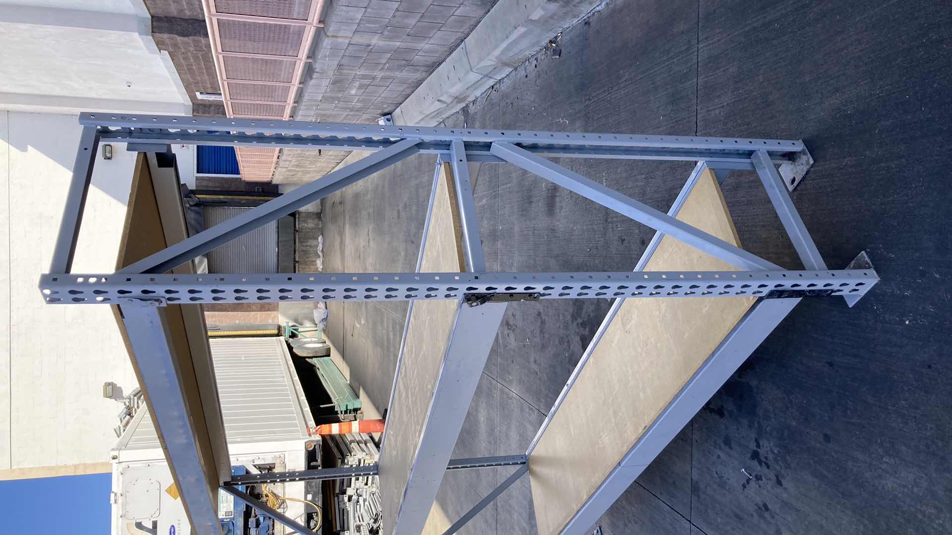 Photo 1 of MADIX HEAVY DUTY STEEL RACK W PARTICLE BOARD SHELVES 102” X 23” H 85”