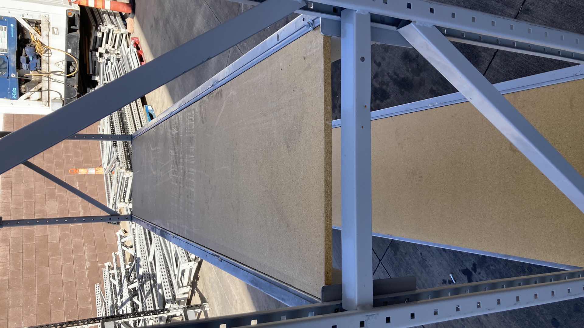 Photo 1 of MADIX HEAVY DUTY STEEL RACK W PARTICLE BOARD SHELVES 102” X 23” H 85”