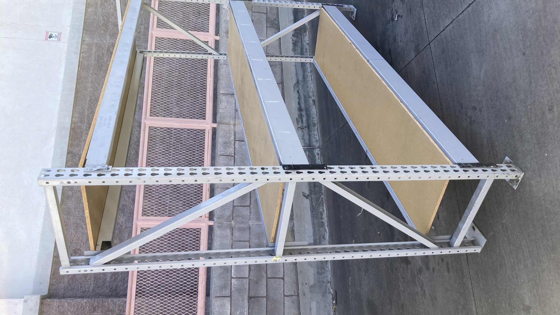 Photo 1 of MADIX HEAVY DUTY STEEL RACK W PARTICLE BOARD SHELVES 102” X 23” H 85”