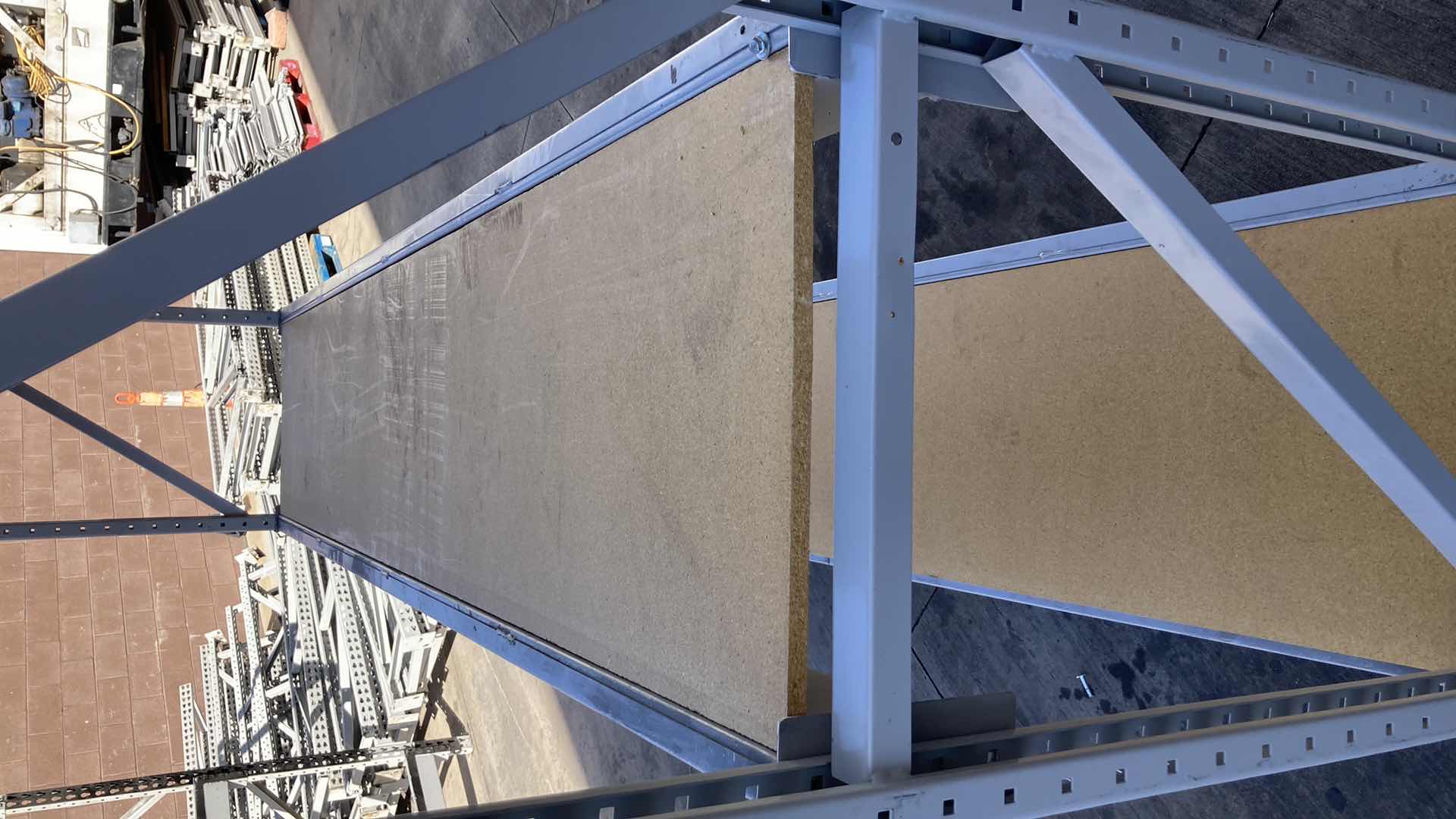 Photo 1 of MADIX HEAVY DUTY STEEL RACK W PARTICLE BOARD SHELVES 102” X 23” H 85”