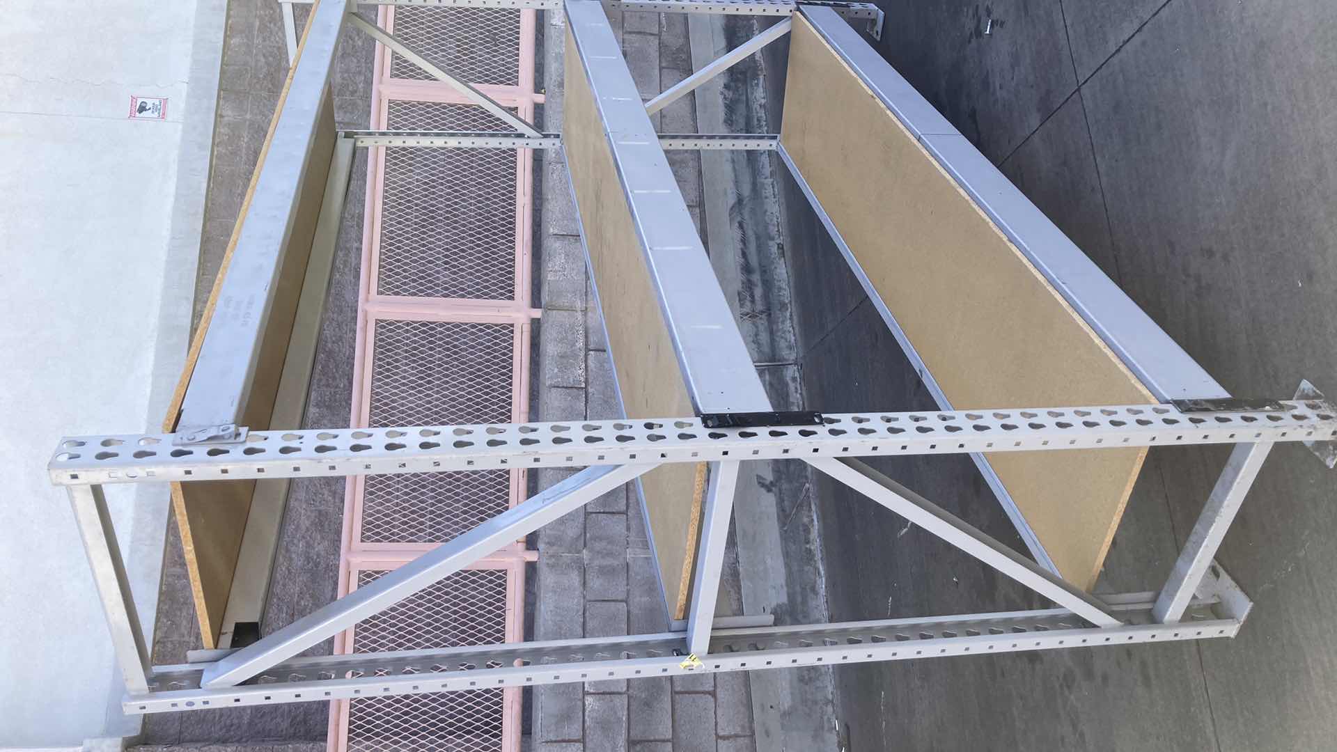 Photo 1 of MADIX HEAVY DUTY STEEL RACK W PARTICLE BOARD SHELVES 102” X 23” H 85”