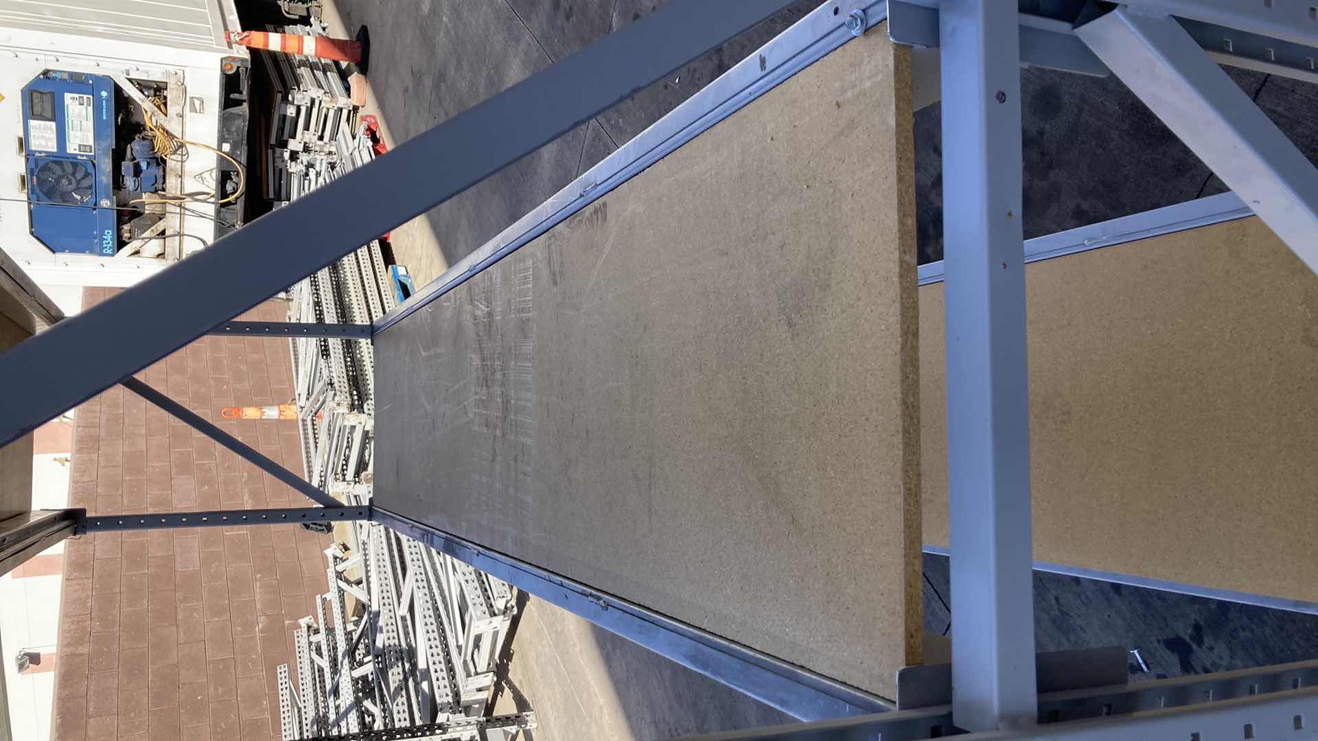 Photo 1 of MADIX HEAVY DUTY STEEL RACK W PARTICLE BOARD SHELVES 102” X 23” H 85”