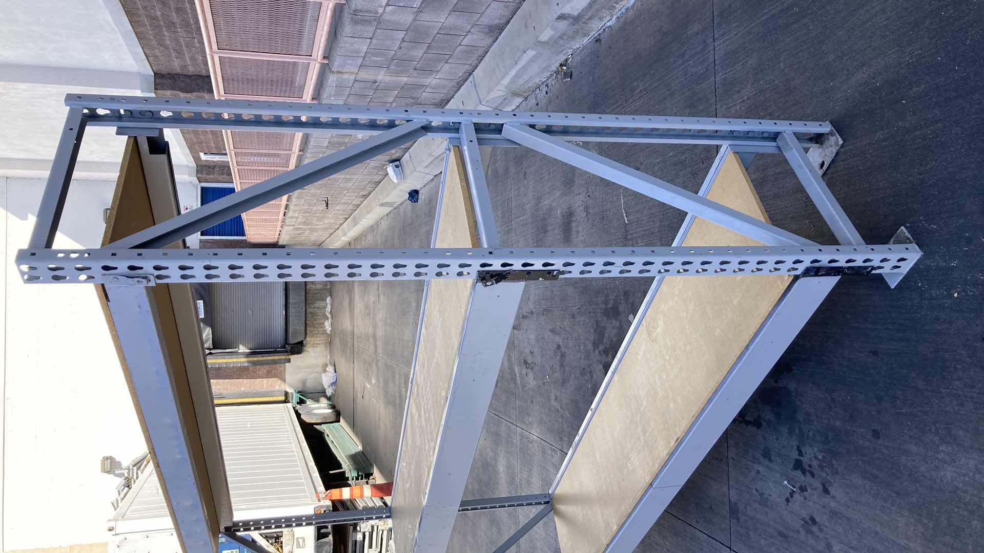 Photo 3 of MADIX HEAVY DUTY STEEL RACK W PARTICLE BOARD SHELVES 102” X 23” H 85”