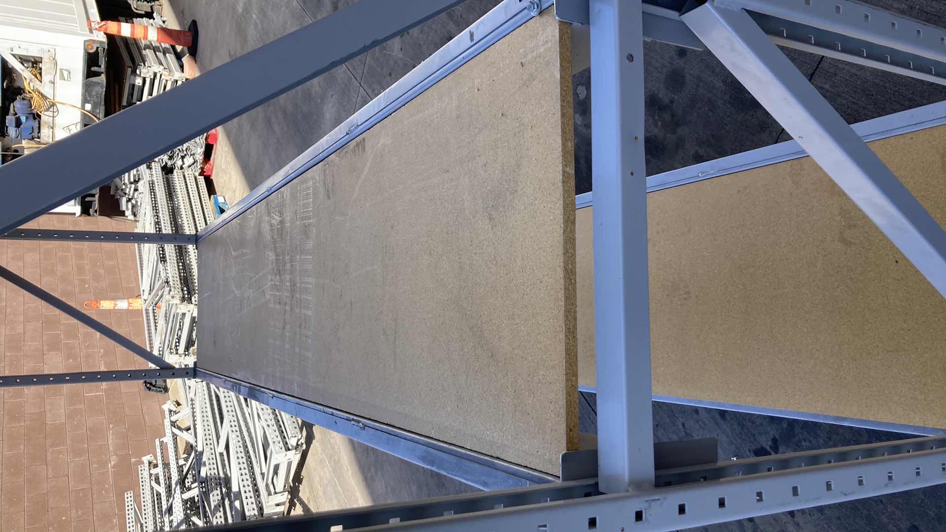 Photo 1 of MADIX HEAVY DUTY STEEL RACK W PARTICLE BOARD SHELVES 102” X 23” H 85”