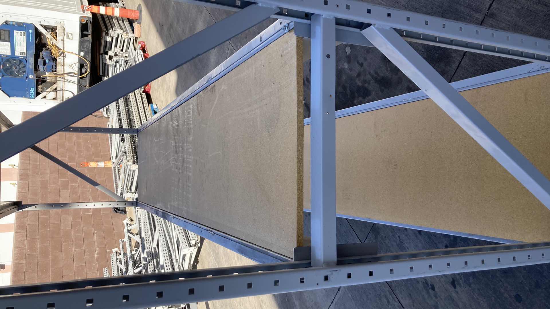 Photo 1 of MADIX HEAVY DUTY STEEL RACK W PARTICLE BOARD SHELVES 102” X 23” H 85”