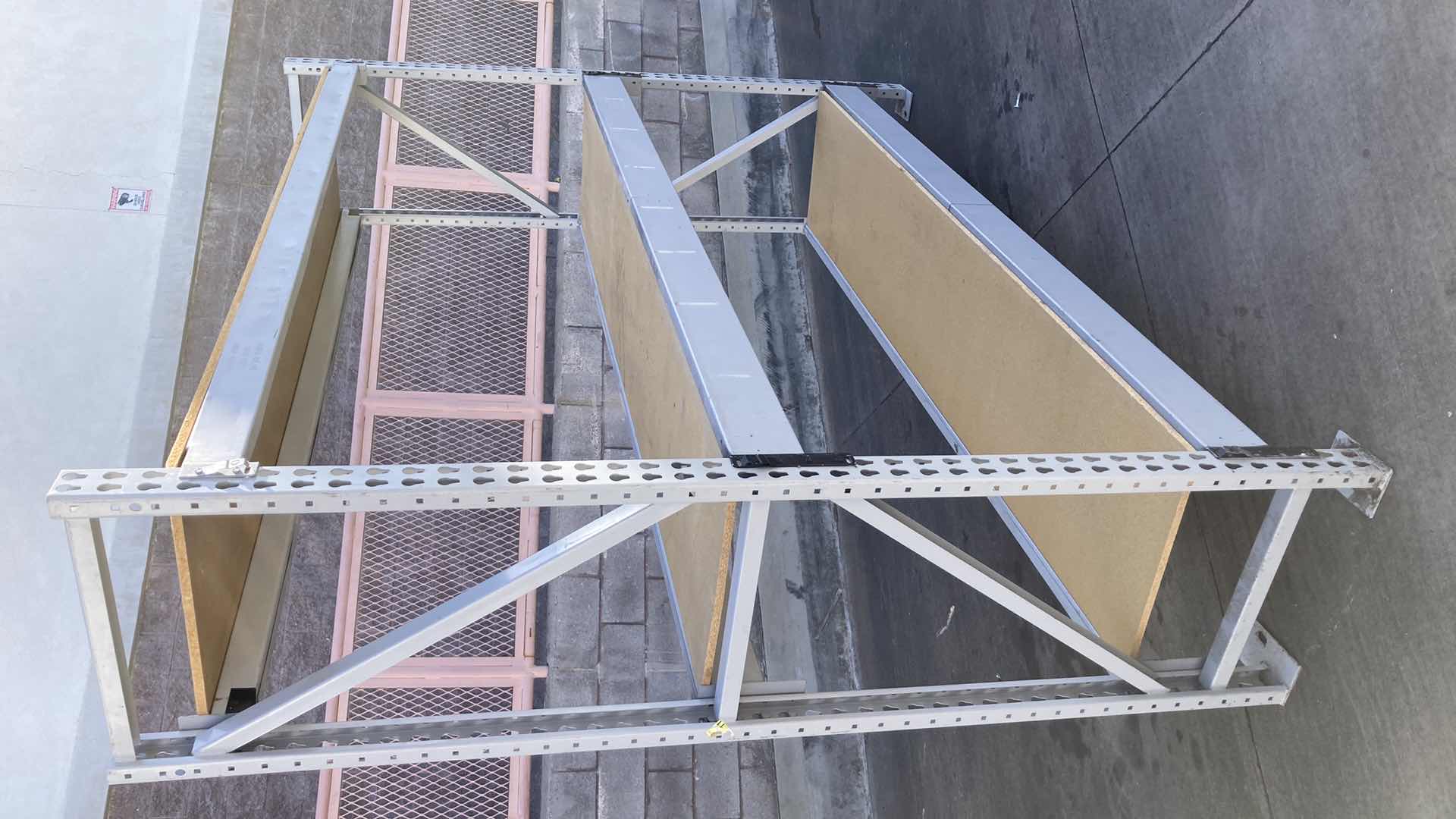 Photo 1 of MADIX HEAVY DUTY STEEL RACK W PARTICLE BOARD SHELVES 102” X 23” H 85”