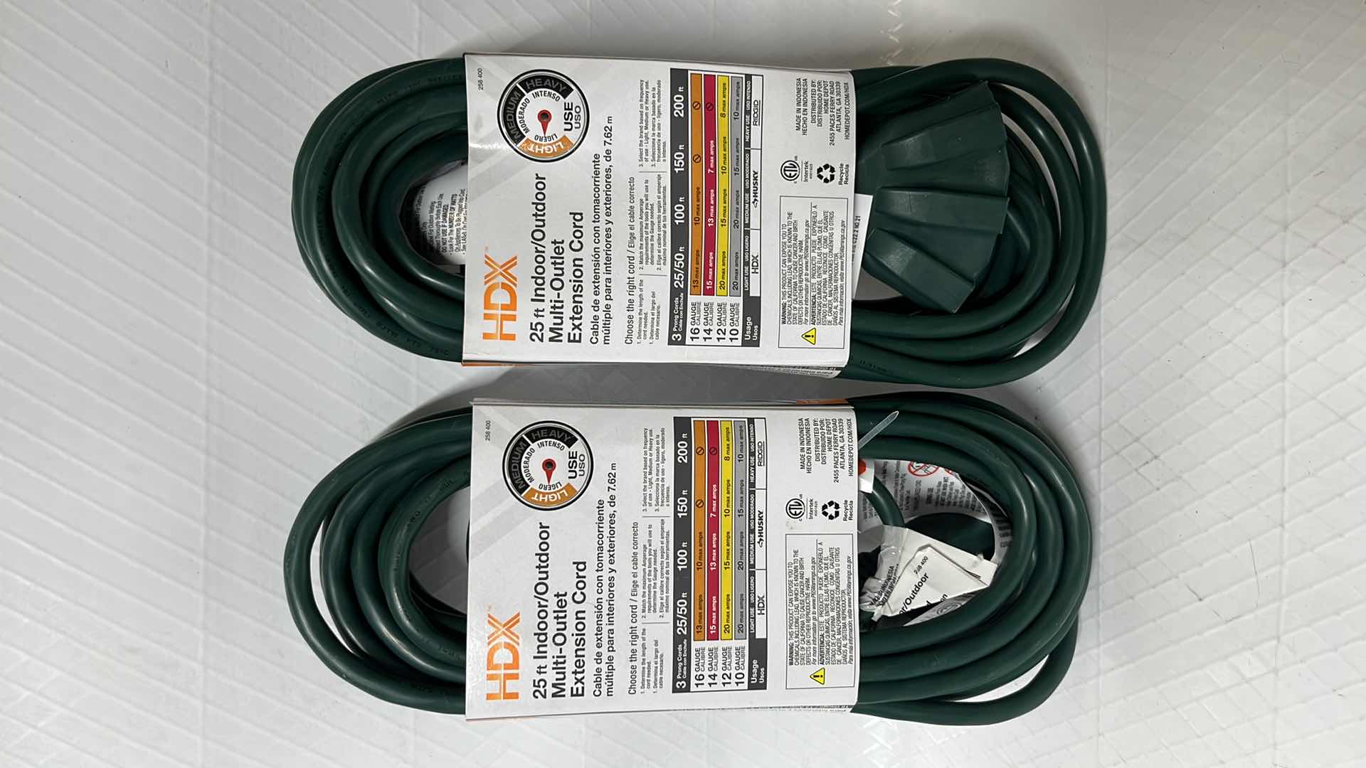 Photo 1 of NEW 2- HDX 25 FT INDOOR/OUTDOOR MULTI-OUTLET EXTENSION CORD, 16 GAUGE