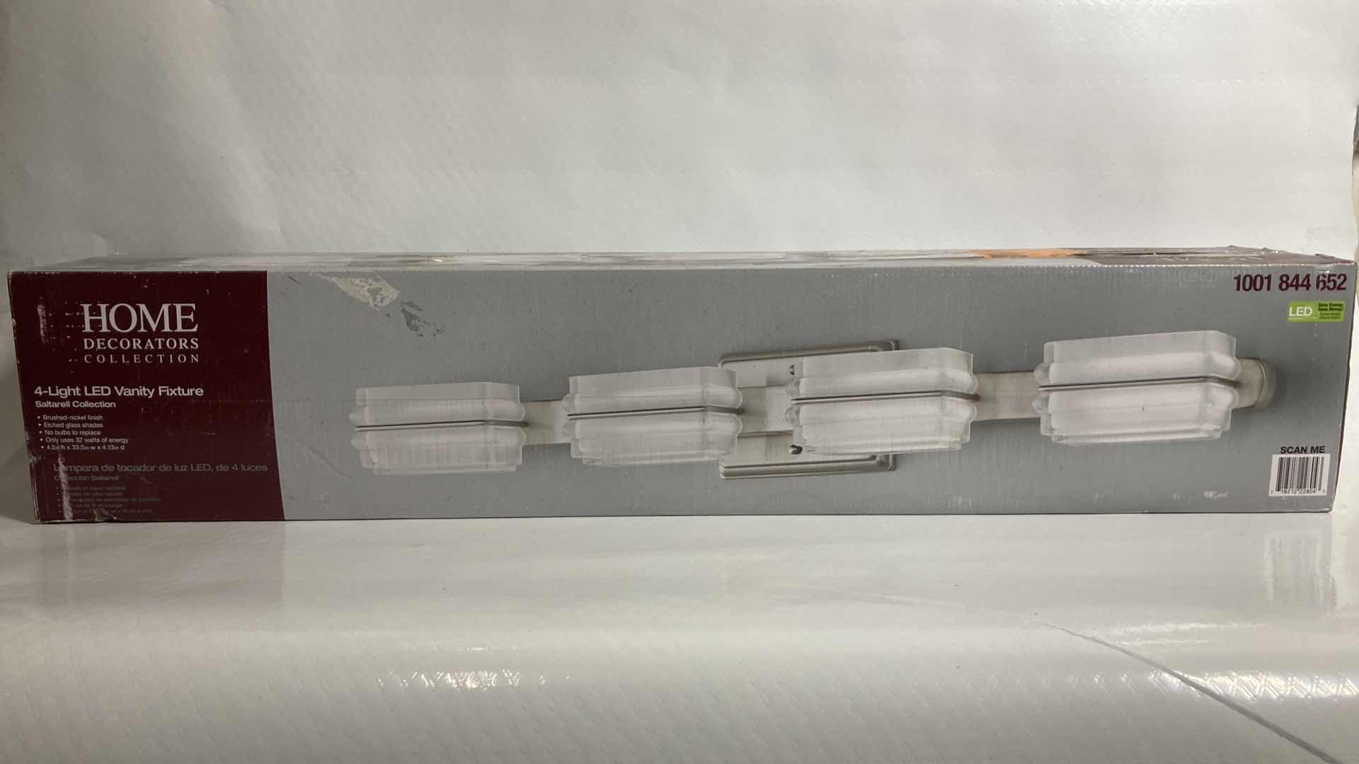 Photo 1 of NEW HOME DECORATORS SALTARELL BRUSHED NICKEL FINISH ETCHED GLASS LED 4 LIGHT VANITY FIXTURE MODEL 1001844652