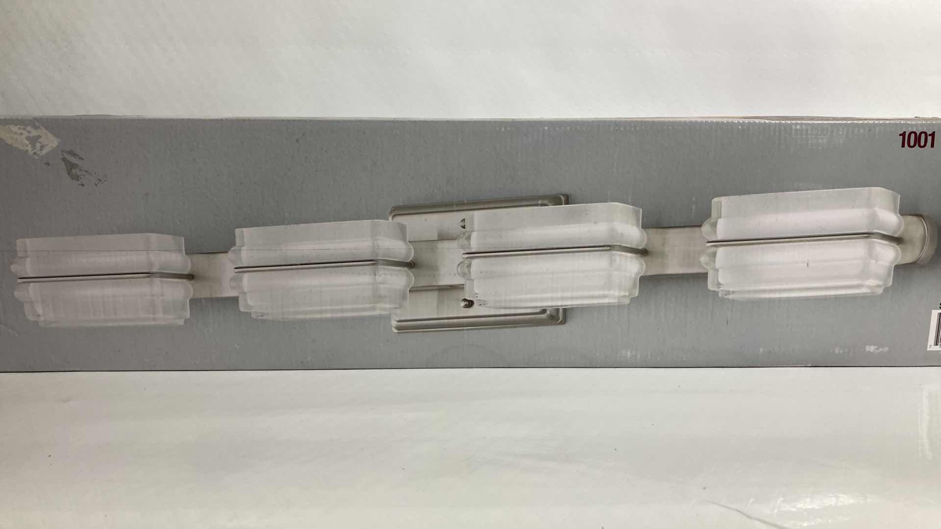 Photo 1 of NEW HOME DECORATORS SALTARELL BRUSHED NICKEL FINISH ETCHED GLASS LED 4 LIGHT VANITY FIXTURE MODEL 1001844652