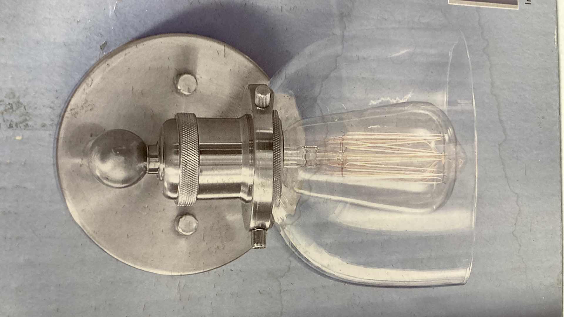 Photo 1 of NEW HOME DECORATORS EVELYN BRUSHED NICKEL FINISH CLEAR GLASS 1 LIGHT WALL SCONCE MODEL 1004693630