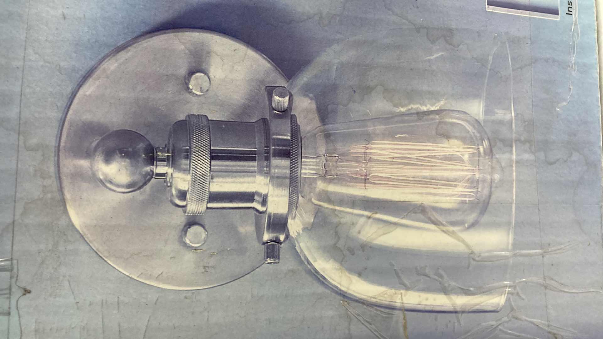 Photo 1 of NEW HOME DECORATORS EVELYN BRUSHED NICKEL FINISH CLEAR GLASS 1 LIGHT WALL SCONCE MODEL 1004693630