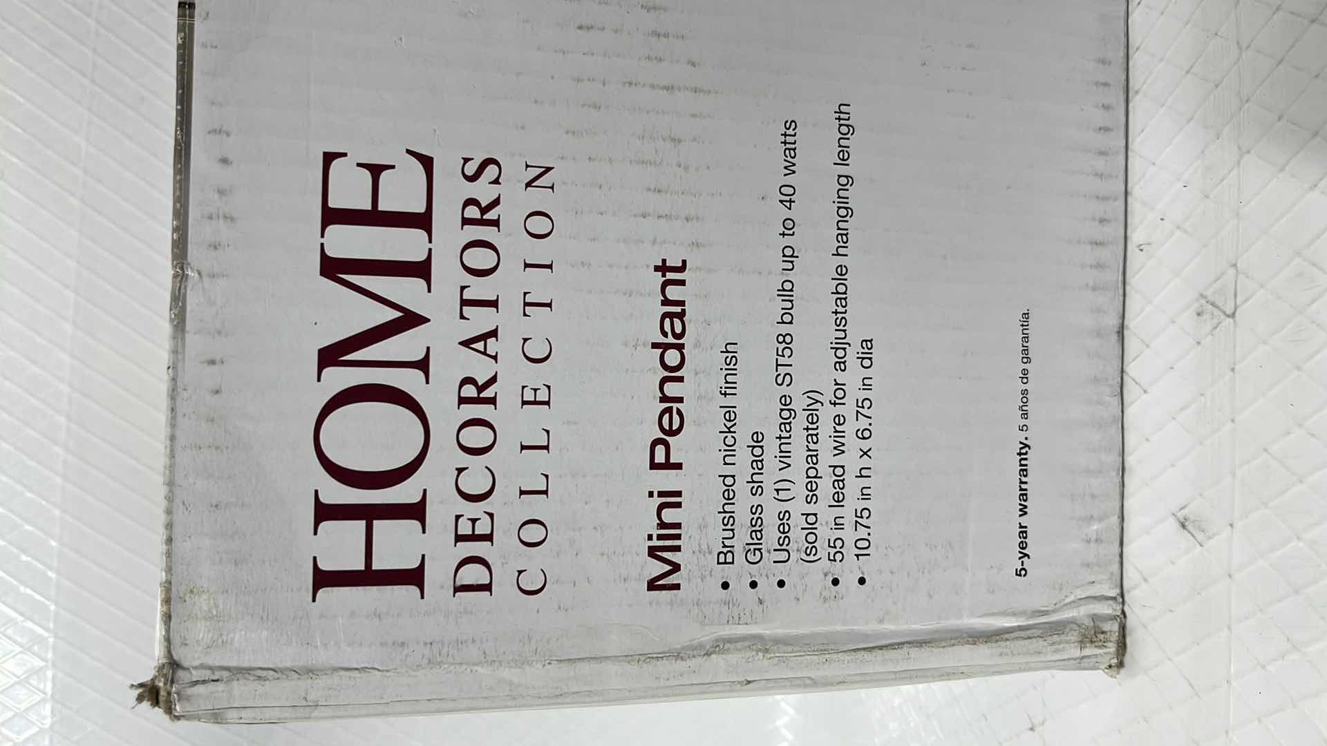 Photo 1 of NEW HOME DECORATORS COLLECTION MINI PENDANT, BRUSHED NICKEL FINISH W CLEAR GLASS SHADE 6.75” X 10.75” H (1002473654)