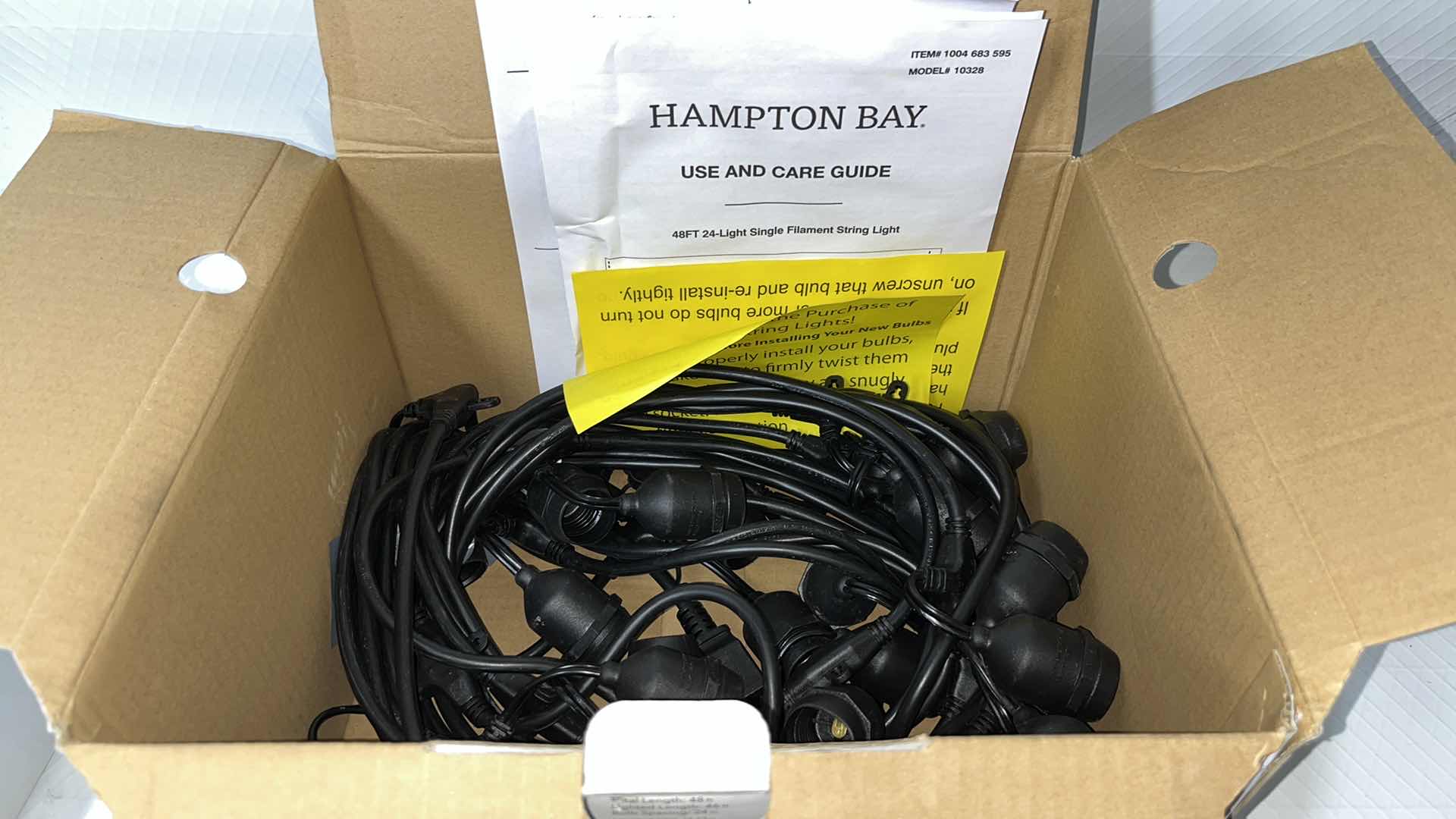 Photo 1 of HAMPTON BAY 48 FT COMMERCIAL GRADE LED PLUG-IN STRING LIGHTS, W 24 SHATTER RESISTANT FILAMENT BULBS (1004683595)