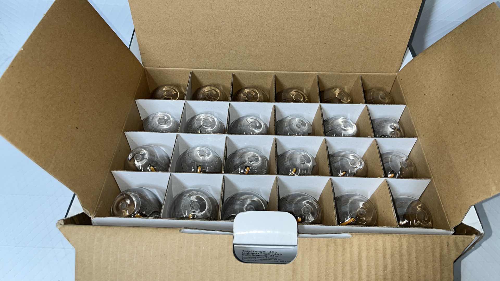 Photo 1 of HAMPTON BAY 48 FT COMMERCIAL GRADE LED PLUG-IN STRING LIGHTS, W 24 SHATTER RESISTANT FILAMENT BULBS (1004683595)