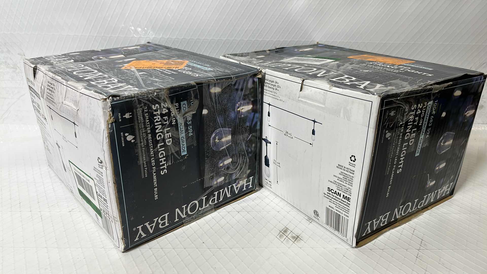 Photo 1 of 2- HAMPTON BAY 24 FT COMMERCIAL GRADE LED PLUG-IN STRING LIGHTS W 12 SHATTER RESISTANT FILAMENT BULBS (1004683594)