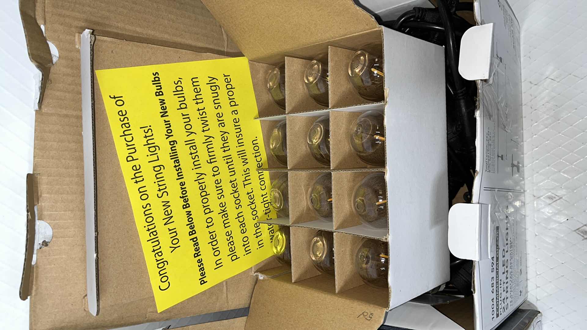 Photo 1 of 2- HAMPTON BAY 24 FT COMMERCIAL GRADE LED PLUG-IN STRING LIGHTS W 12 SHATTER RESISTANT FILAMENT BULBS (1004683594)