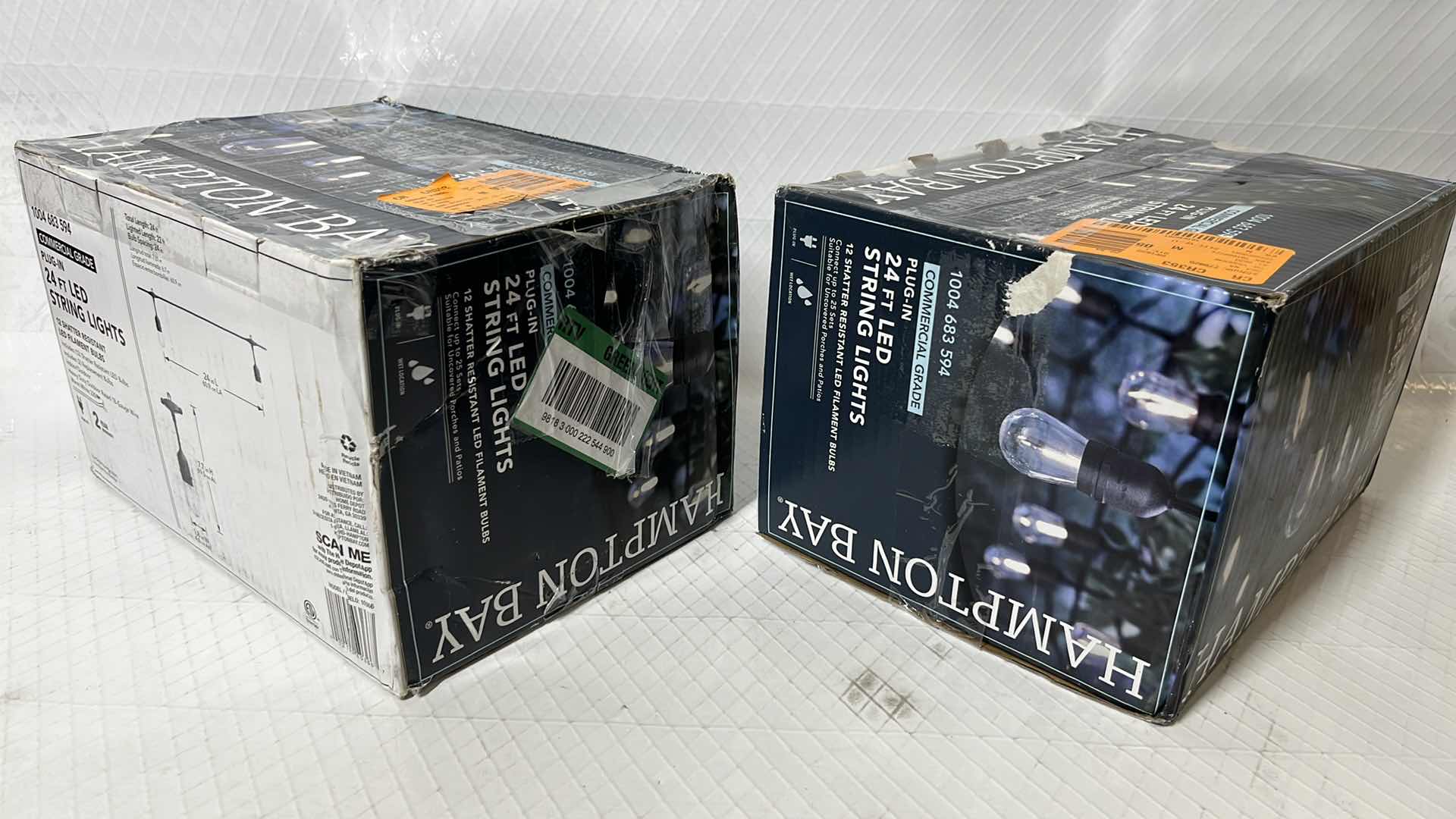 Photo 1 of 2- HAMPTON BAY 24 FT COMMERCIAL GRADE LED PLUG-IN STRING LIGHTS W 12 SHATTER RESISTANT FILAMENT BULBS (1004683594)