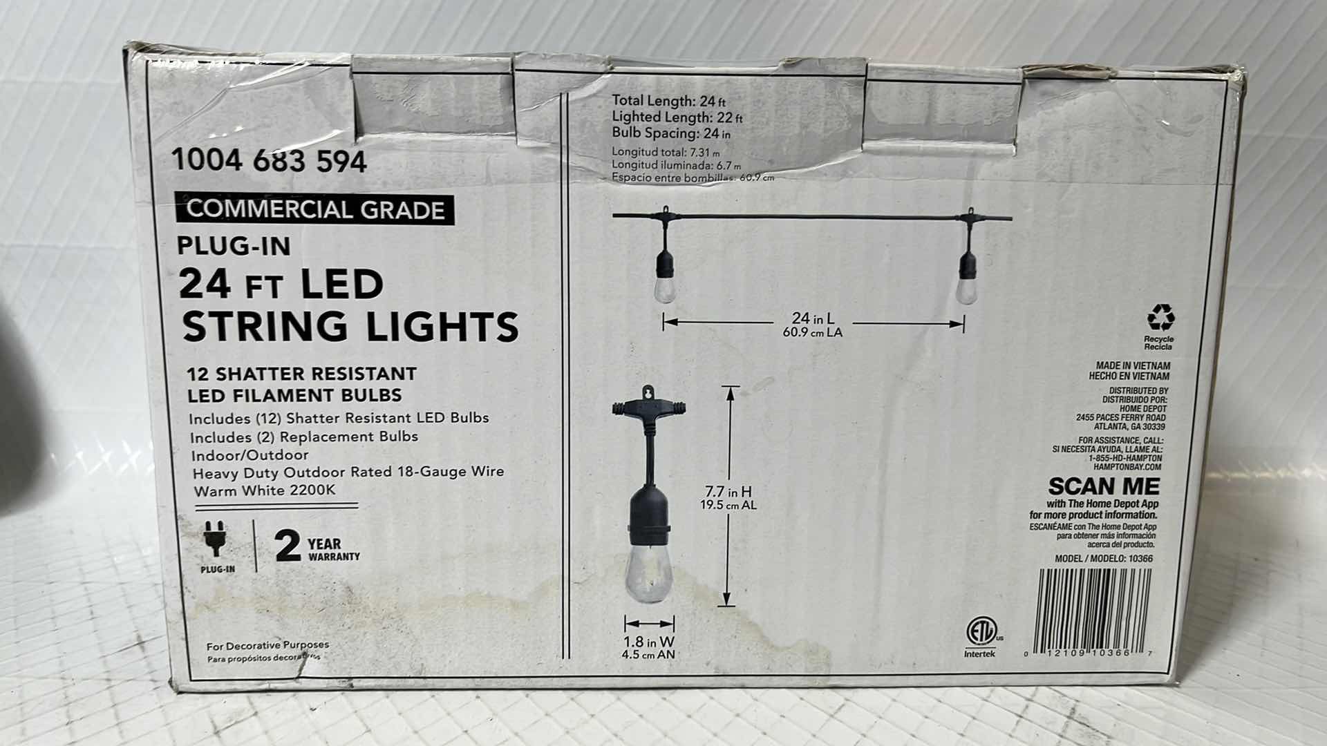 Photo 1 of 2- HAMPTON BAY 24 FT COMMERCIAL GRADE LED PLUG-IN STRING LIGHTS W 12 SHATTER RESISTANT FILAMENT BULBS (1004683594)