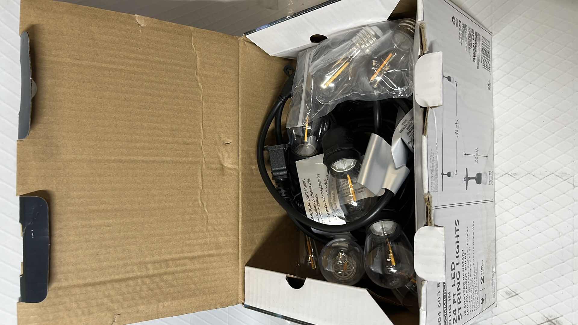 Photo 1 of 2- HAMPTON BAY 24 FT COMMERCIAL GRADE LED PLUG-IN STRING LIGHTS W 12 SHATTER RESISTANT FILAMENT BULBS (1004683594)