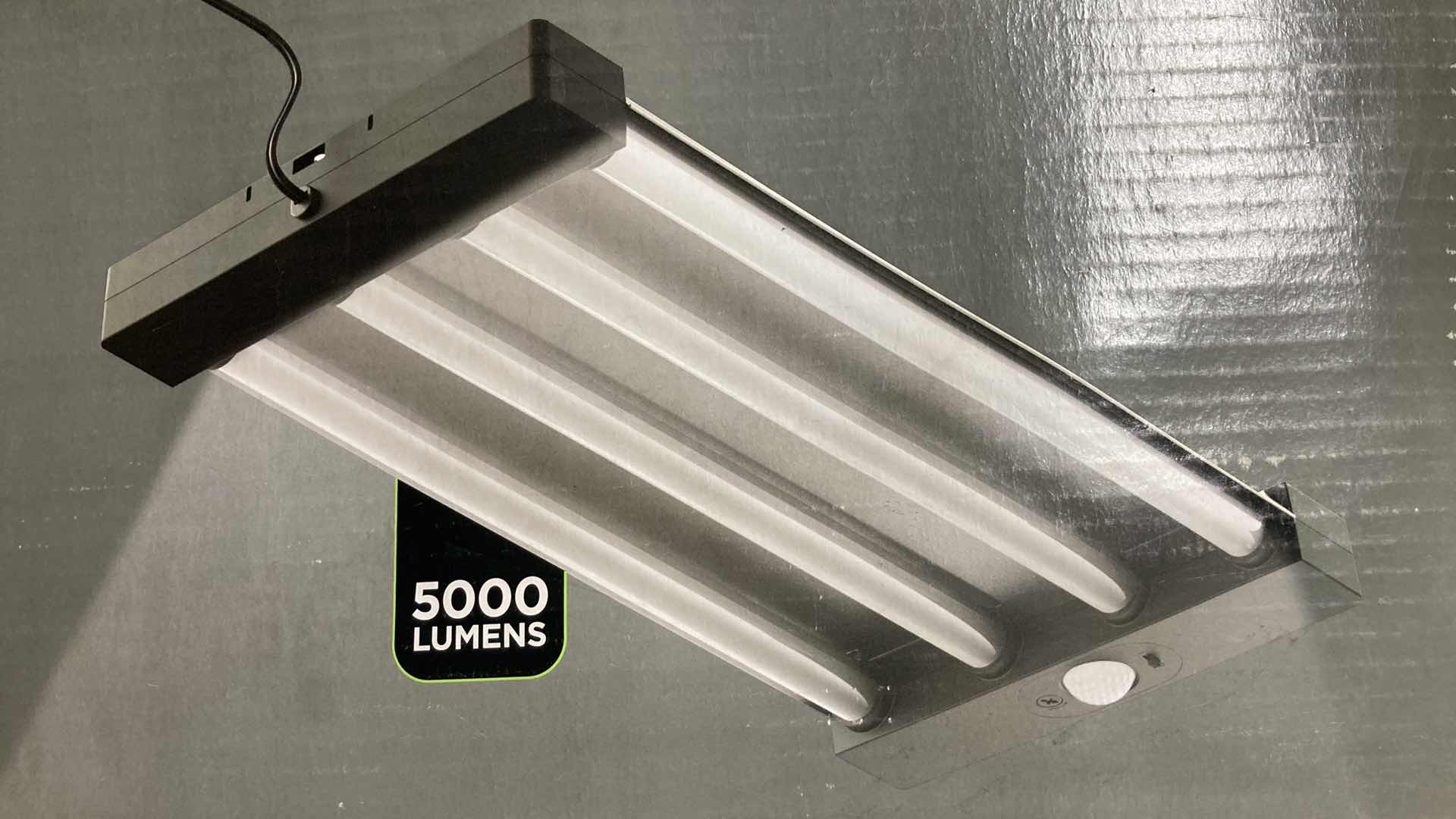 Photo 1 of NEW COMMERCIAL ELECTRIC LED MOTION SENSING BLACK/GRAY SHOP LIGHT MODEL 1003622077