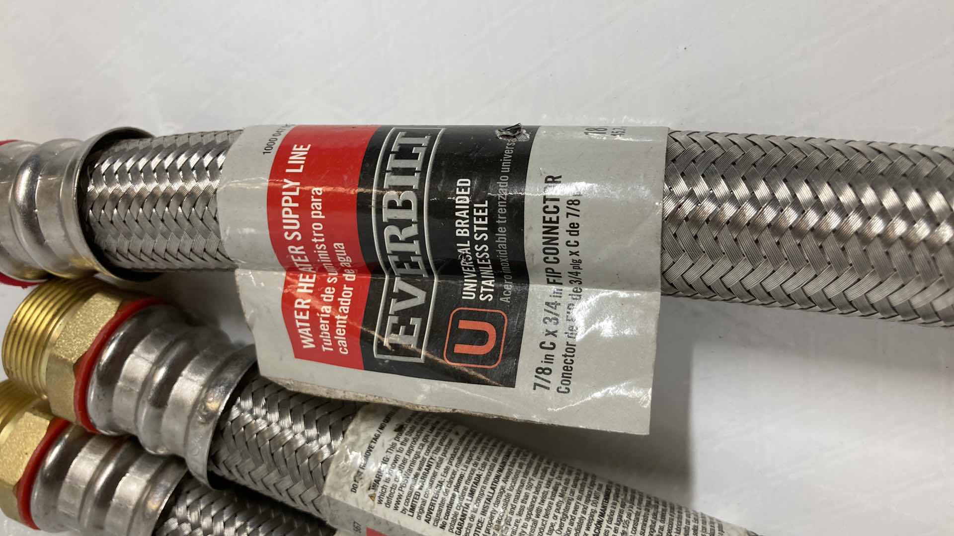 Photo 1 of NEW EVERBILT UNIVERSAL BRAIDED STAINLESS STEEL WATER HEATER SUPPLY LINE (3) 7/8” C 3/4” X 18”