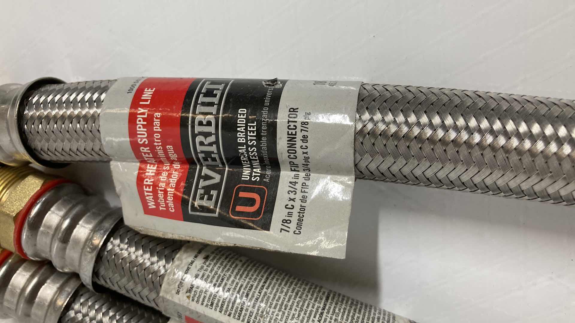 Photo 1 of NEW EVERBILT UNIVERSAL BRAIDED STAINLESS STEEL WATER HEATER SUPPLY LINE (3) 7/8” C 3/4” X 18”