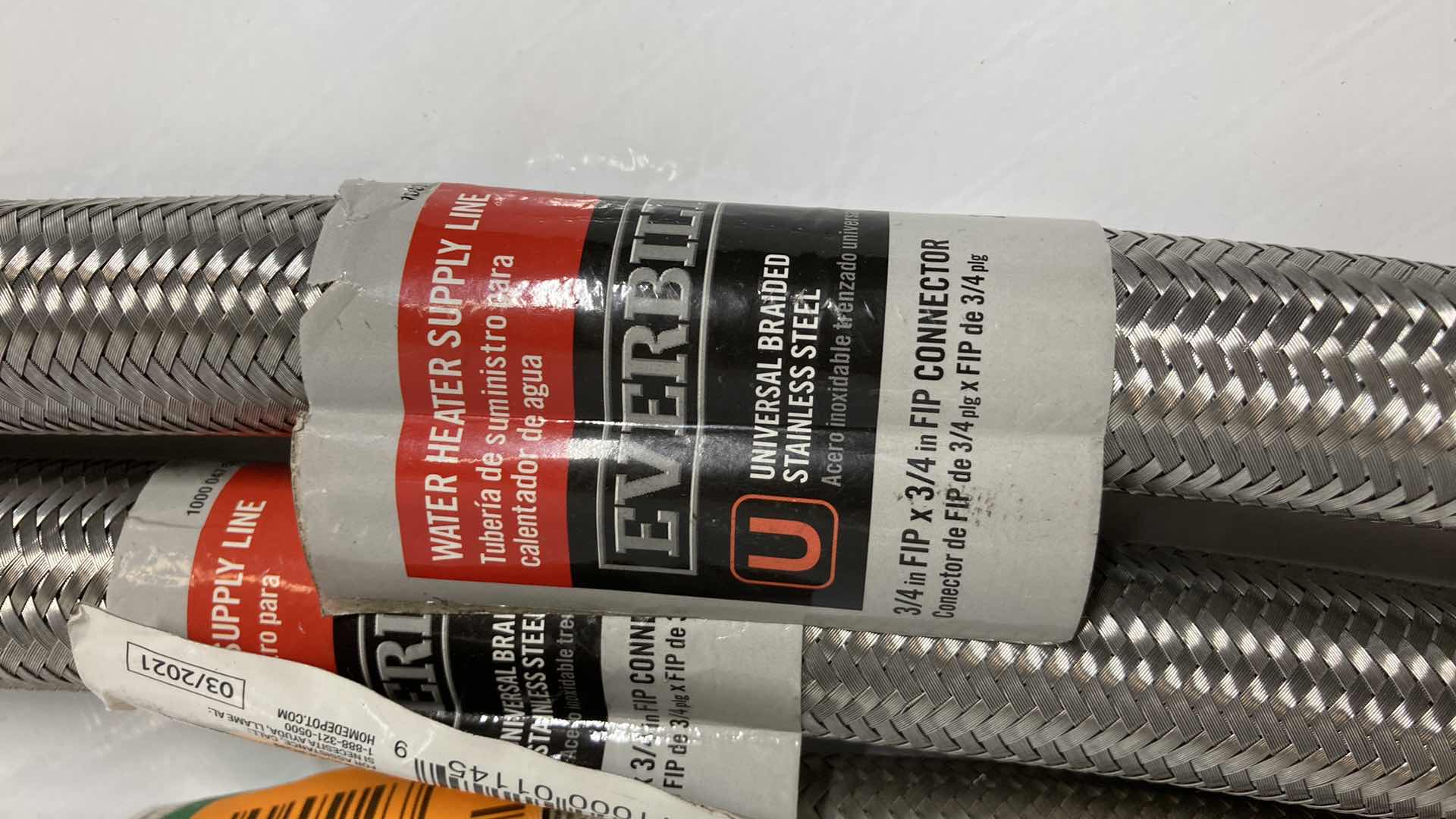 Photo 1 of NEW EVERBILT UNIVERSAL BRAIDED STAINLESS STEEL WATER HEATER SUPPLY LINE (3) 7/8” C 3/4” X 24”