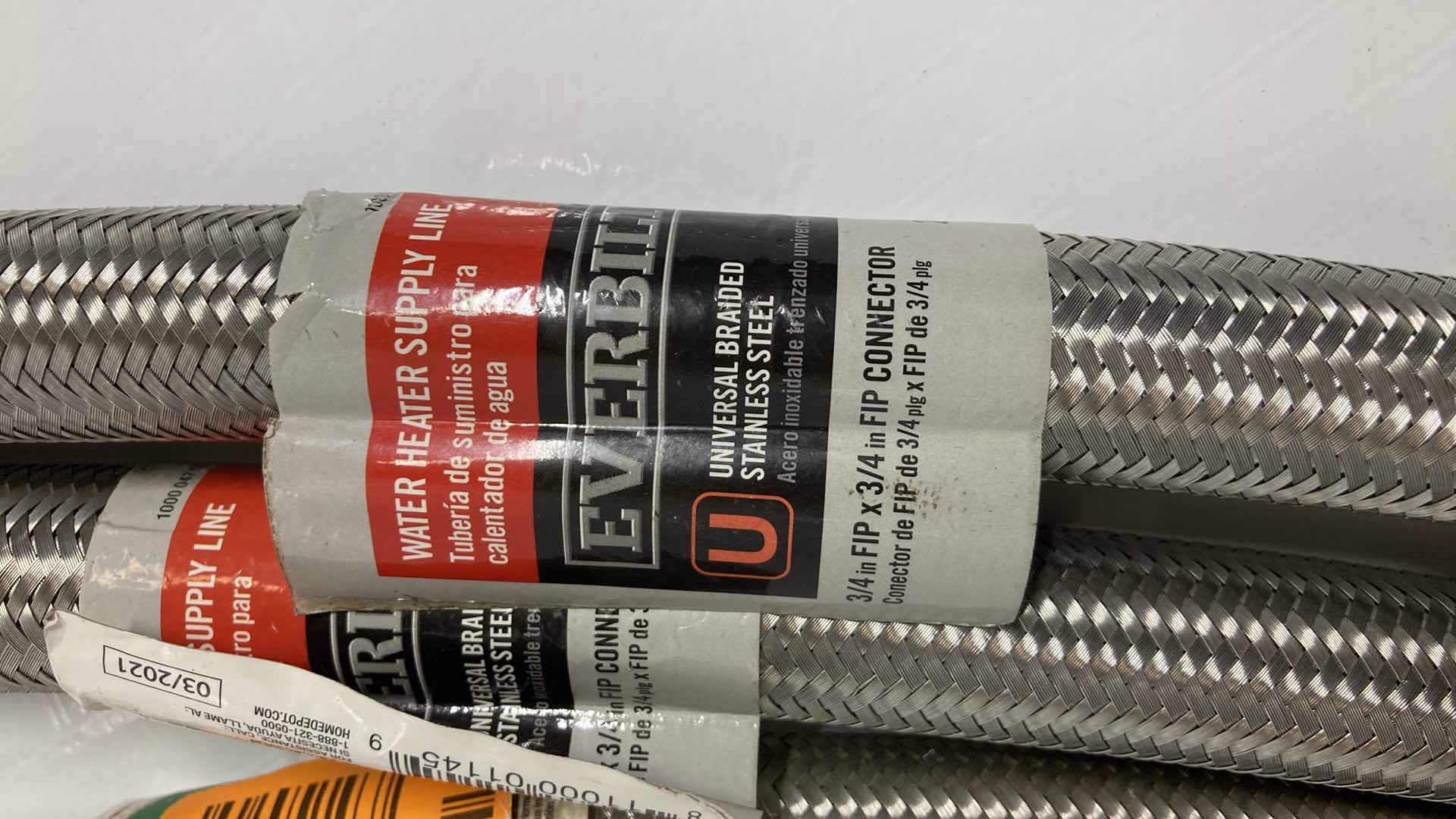 Photo 1 of NEW EVERBILT UNIVERSAL BRAIDED STAINLESS STEEL WATER HEATER SUPPLY LINE (3) 7/8” C 3/4” X 24”