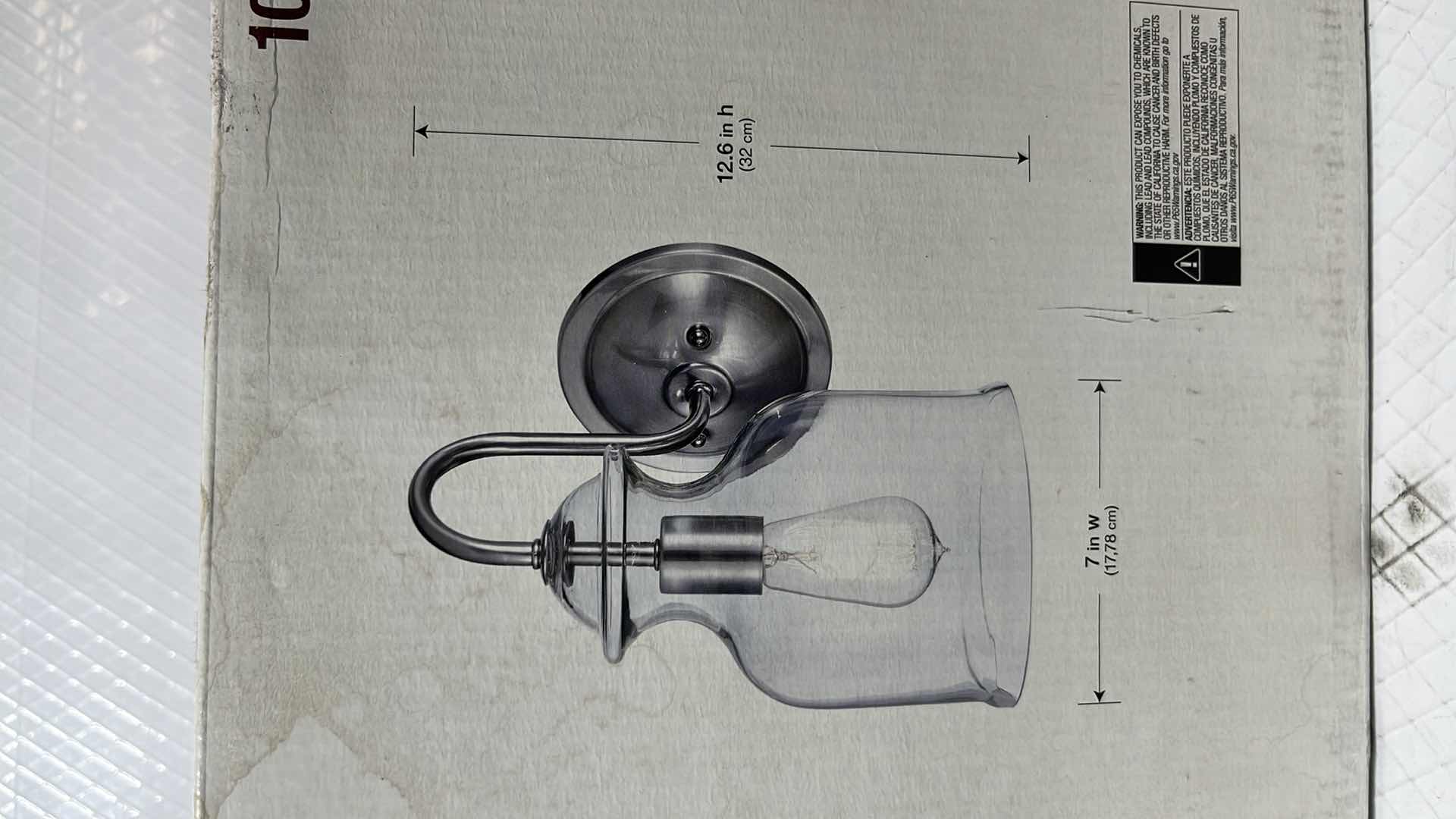 Photo 1 of HOME DECORATORS COLLECTION GARRIDAN COLLECTION SCONCE, BRUSHED NICKEL FINISH W CLEAR GLASS SHADE (1002 427 039)