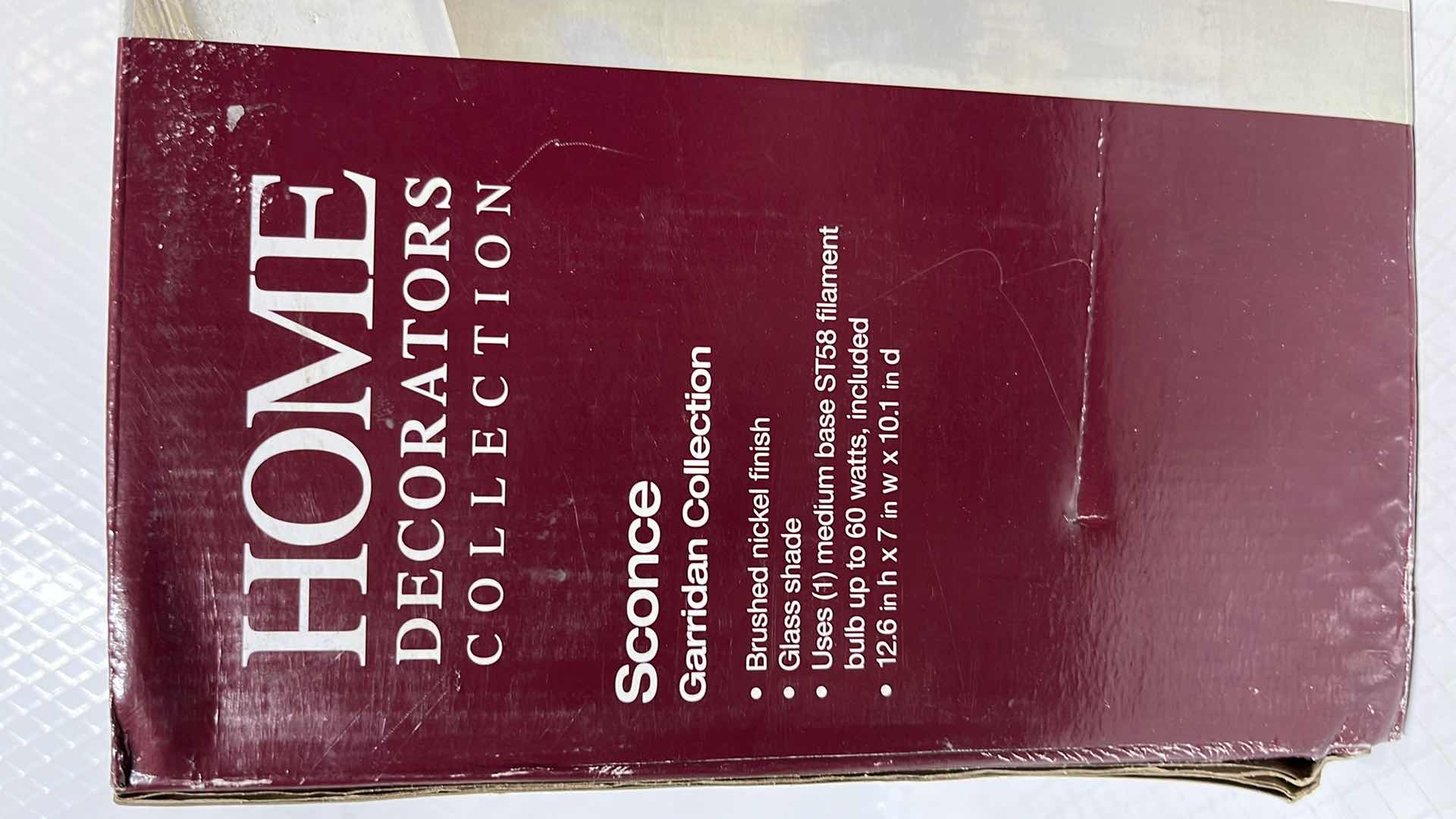 Photo 1 of HOME DECORATORS COLLECTION GARRIDAN COLLECTION SCONCE, BRUSHED NICKEL FINISH W CLEAR GLASS SHADE (1002 427 039)