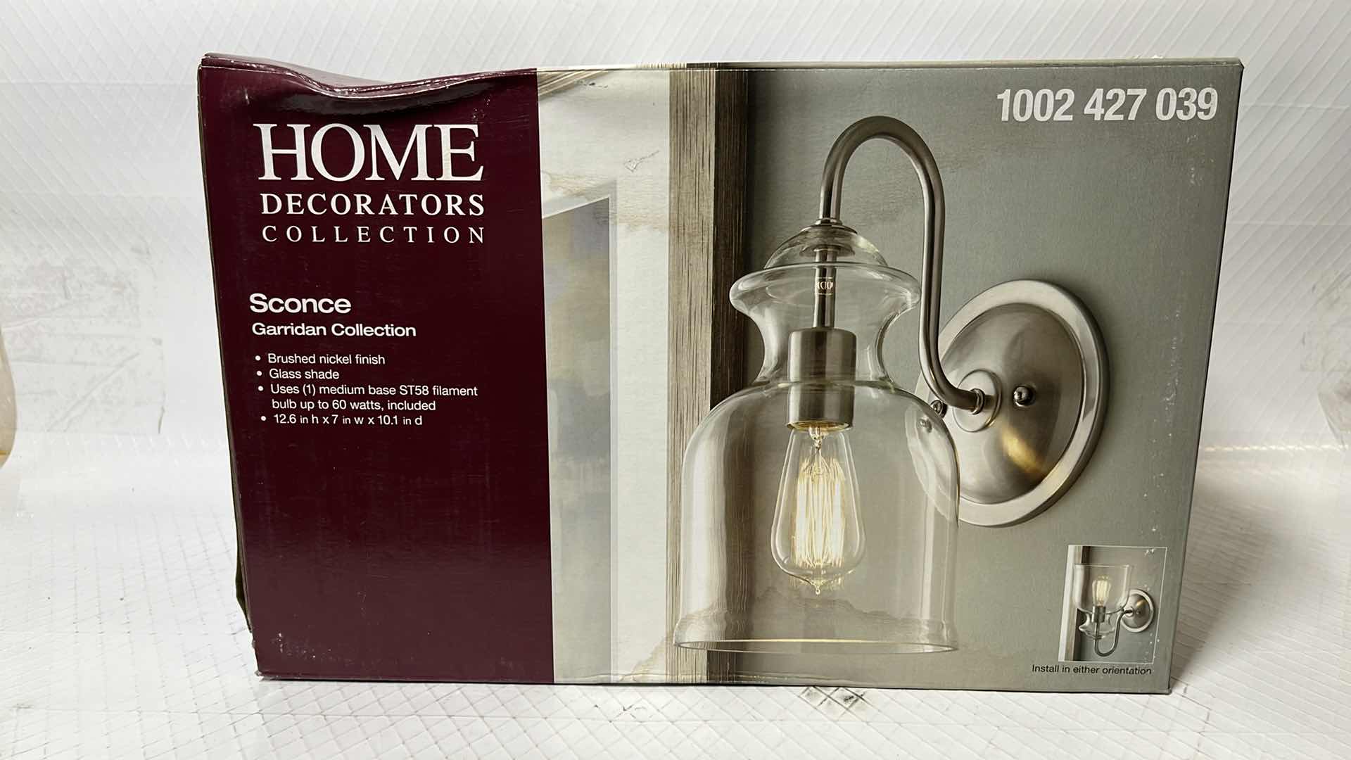 Photo 1 of HOME DECORATORS COLLECTION GARRIDAN COLLECTION SCONCE, BRUSHED NICKEL FINISH W CLEAR GLASS SHADE (1002 427 039)