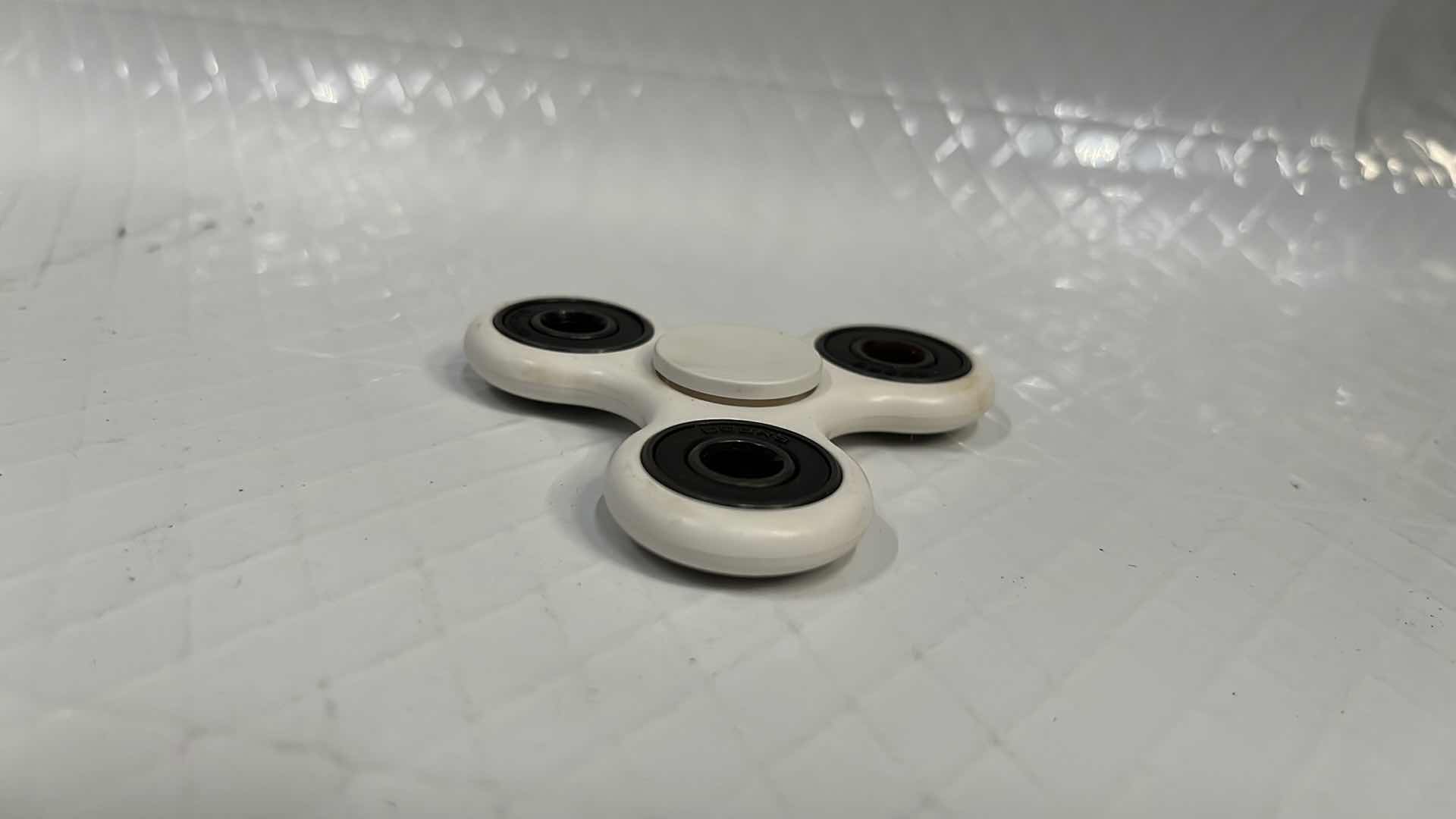 Photo 1 of 10- WHITE FIDGET SPINNER TOY, STRESS TOOL FINGER BALANCE FUN