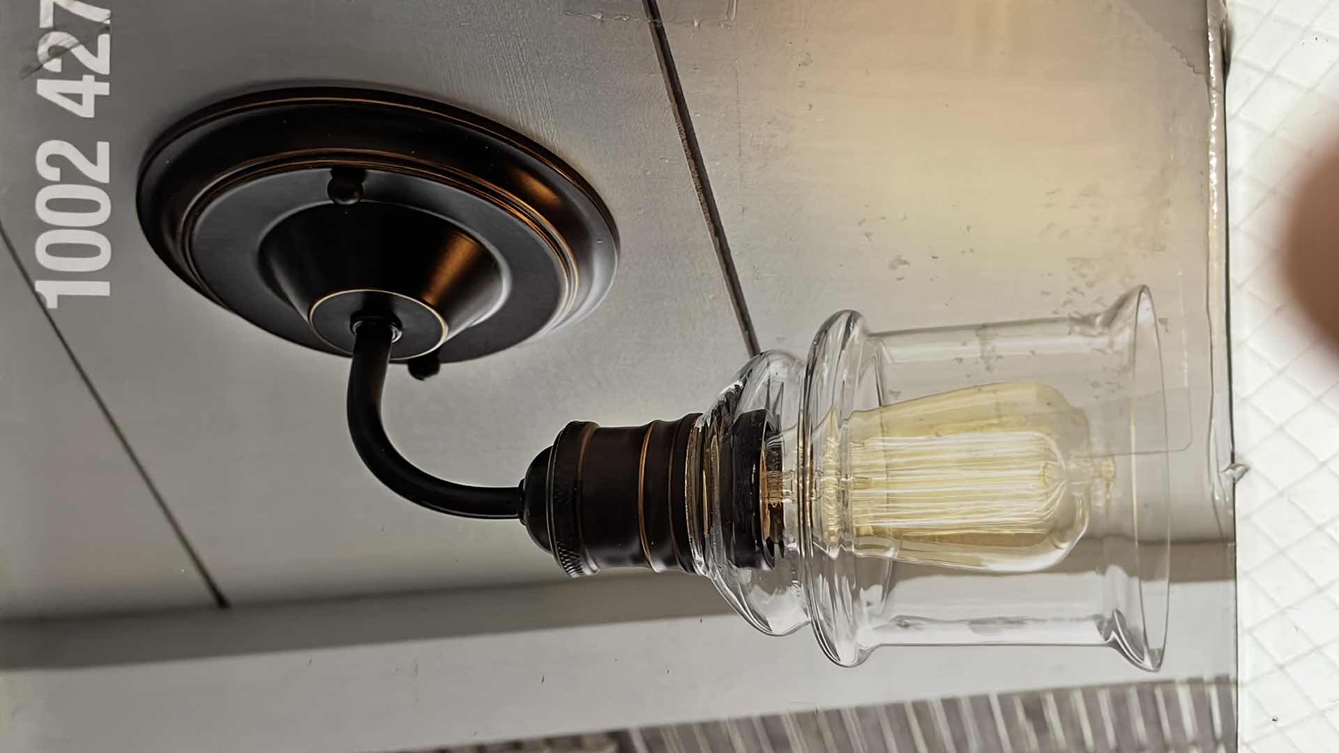 Photo 1 of NEW HOME DECORATORS COLLECTION BARDEN POINTE SCONCE LIGHT FIXTURE, ANTIQUE BRONZE FINISH W GLASS SHADE, 5.13” X 12.5”H (1002 427 123)