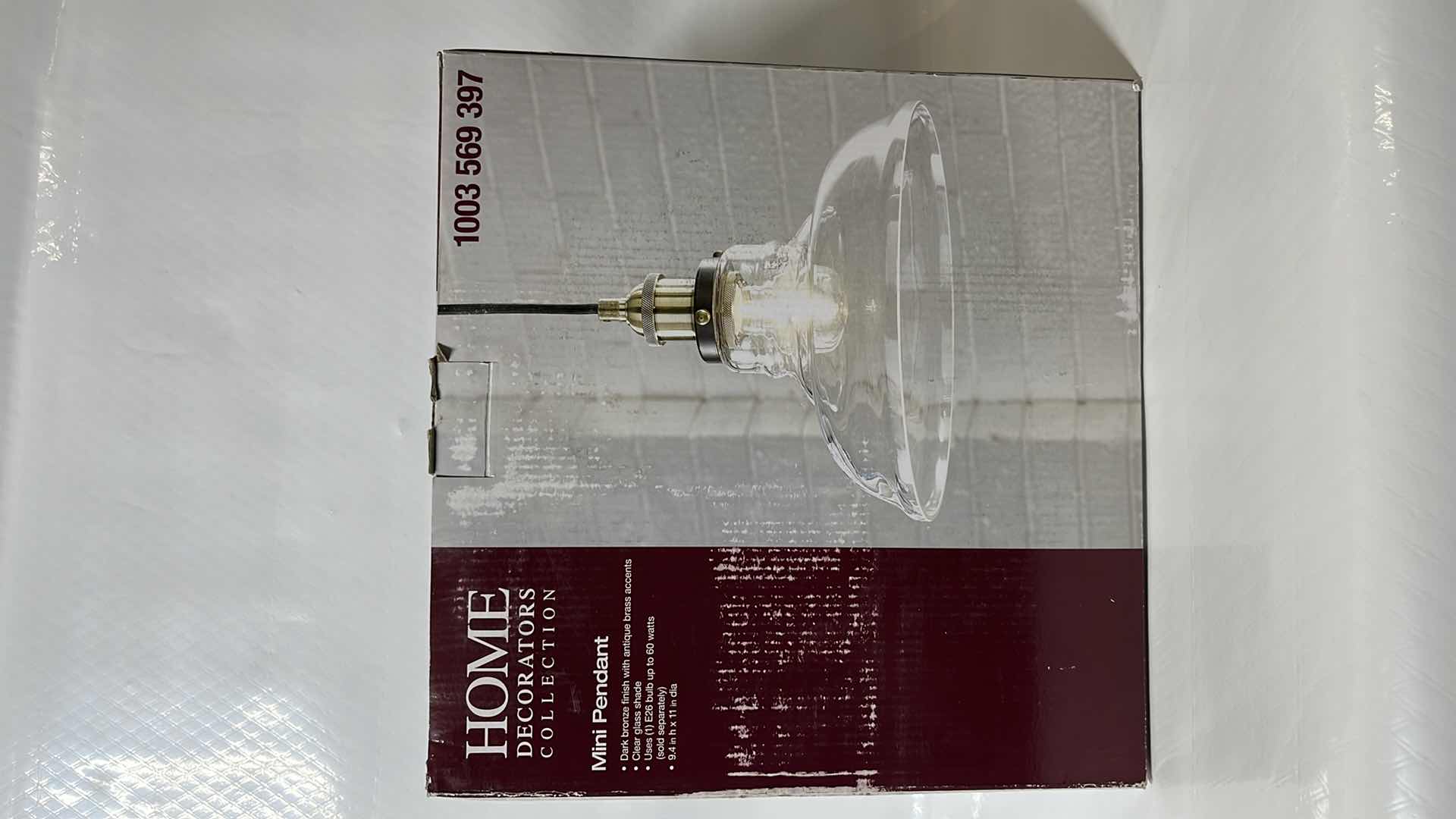 Photo 1 of NEW HOME DECORATORS COLLECTION MINI PENDANT LIGHT FIXTURE, DARK BRONZE FINISH W ANTIQUE BRASS ACCENTS W CLEAR GLASS SHADE (1003 569 397)