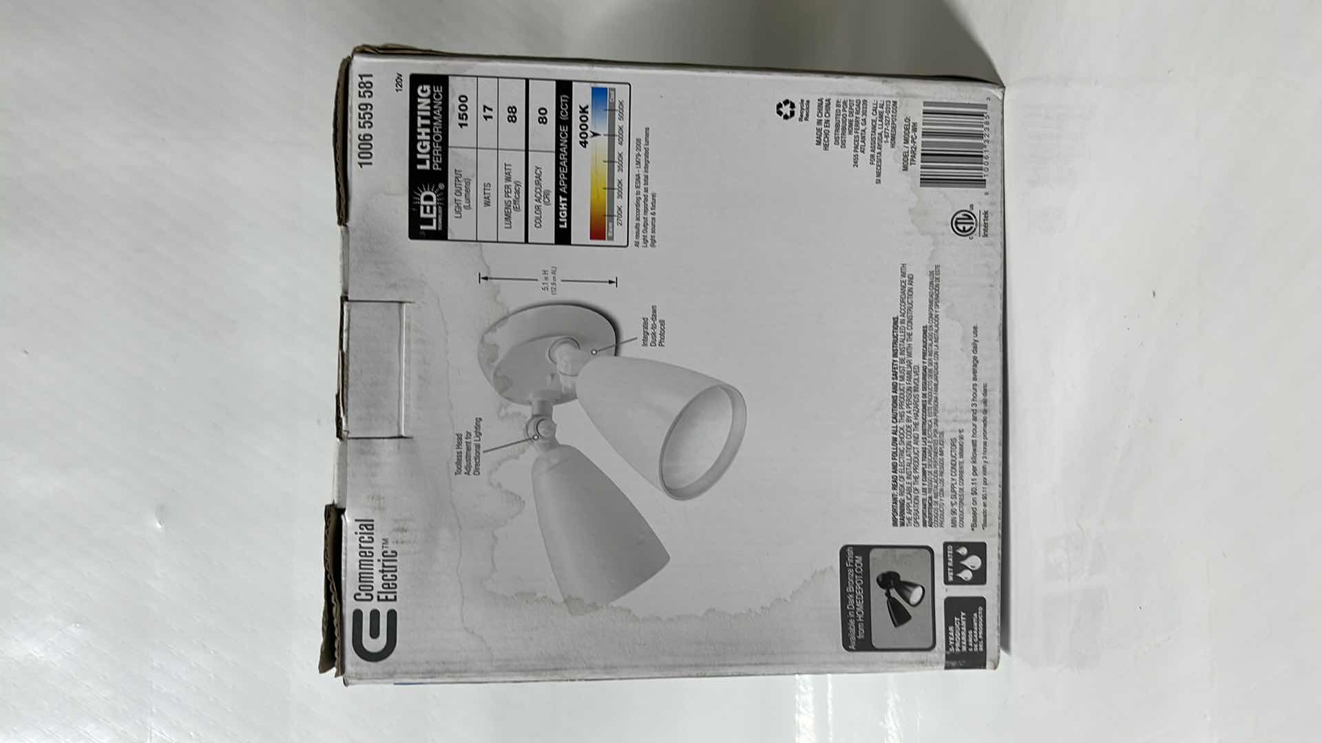 Photo 1 of COMMERCIAL ELECTRIC LED TWIN HEAD PAR FLOOD LIGHT, WALL/EAVE MOUNTABLE, 1500 LUMENS, WHITE FINISH (1006 559 581)