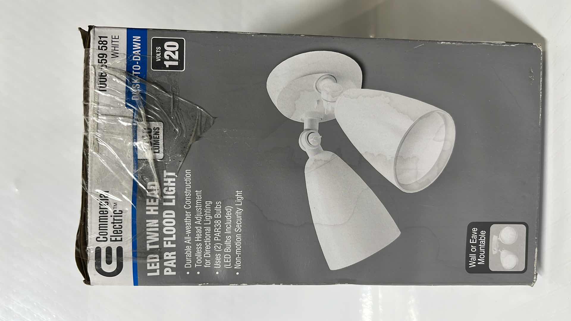 Photo 1 of COMMERCIAL ELECTRIC LED TWIN HEAD PAR FLOOD LIGHT, WALL/EAVE MOUNTABLE, 1500 LUMENS, WHITE FINISH (1006 559 581)